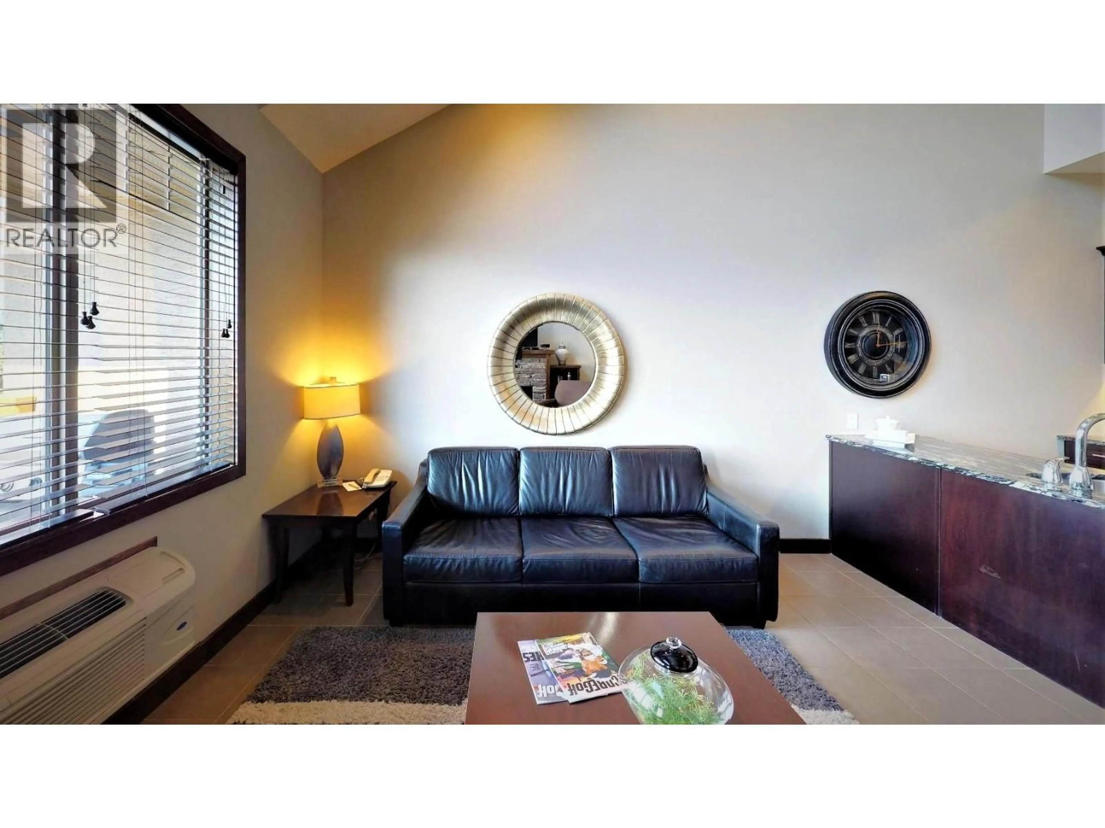 Living room with furniture, wood/laminate floor for 735 M1 - 700 BIGHORN BOULEVARD, Radium Hot Springs British Columbia V0A1M0