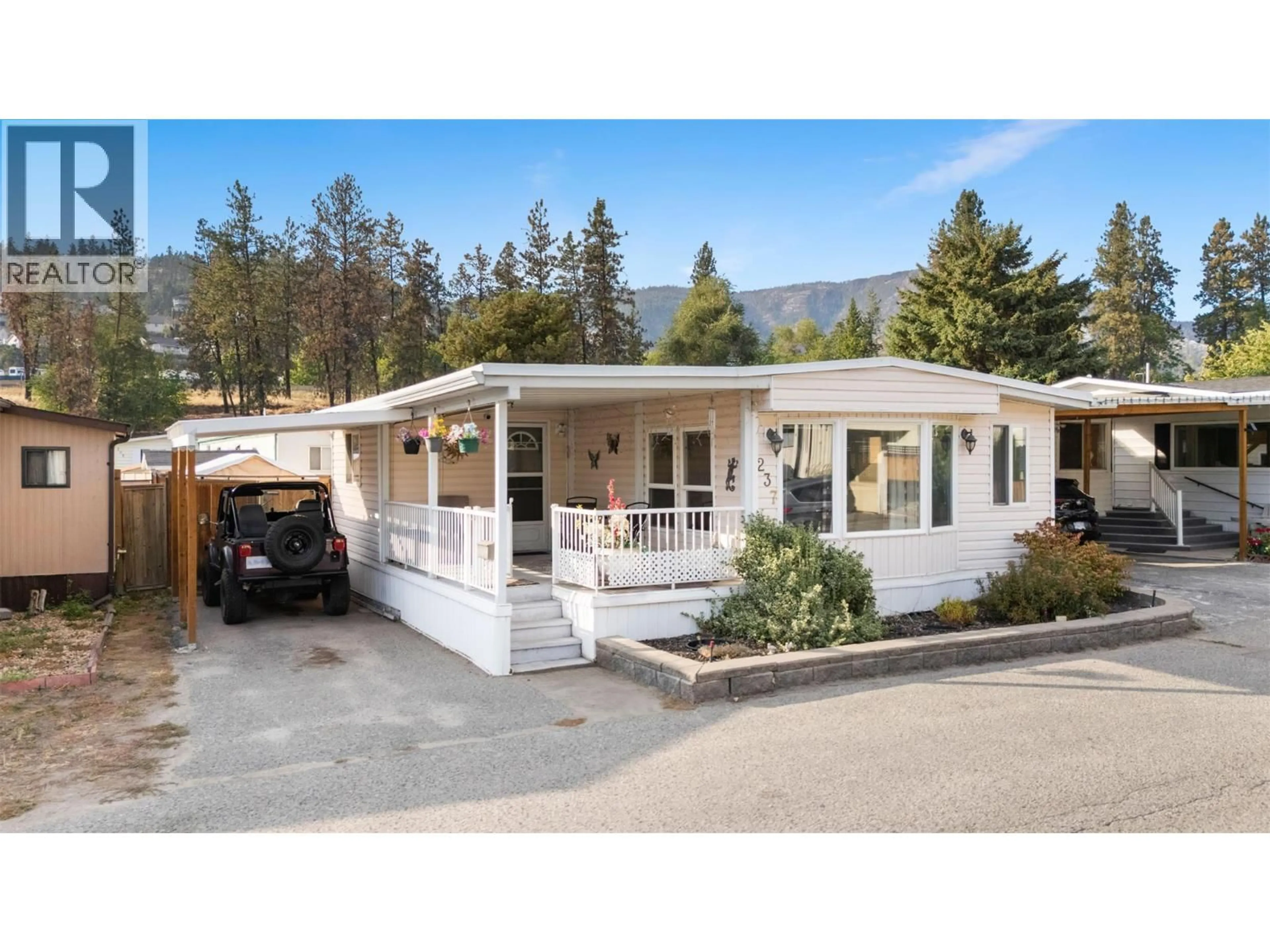 Home with vinyl exterior material, mountain view for 237 - 1999 97 HIGHWAY SOUTH, West Kelowna British Columbia V1Z1B2