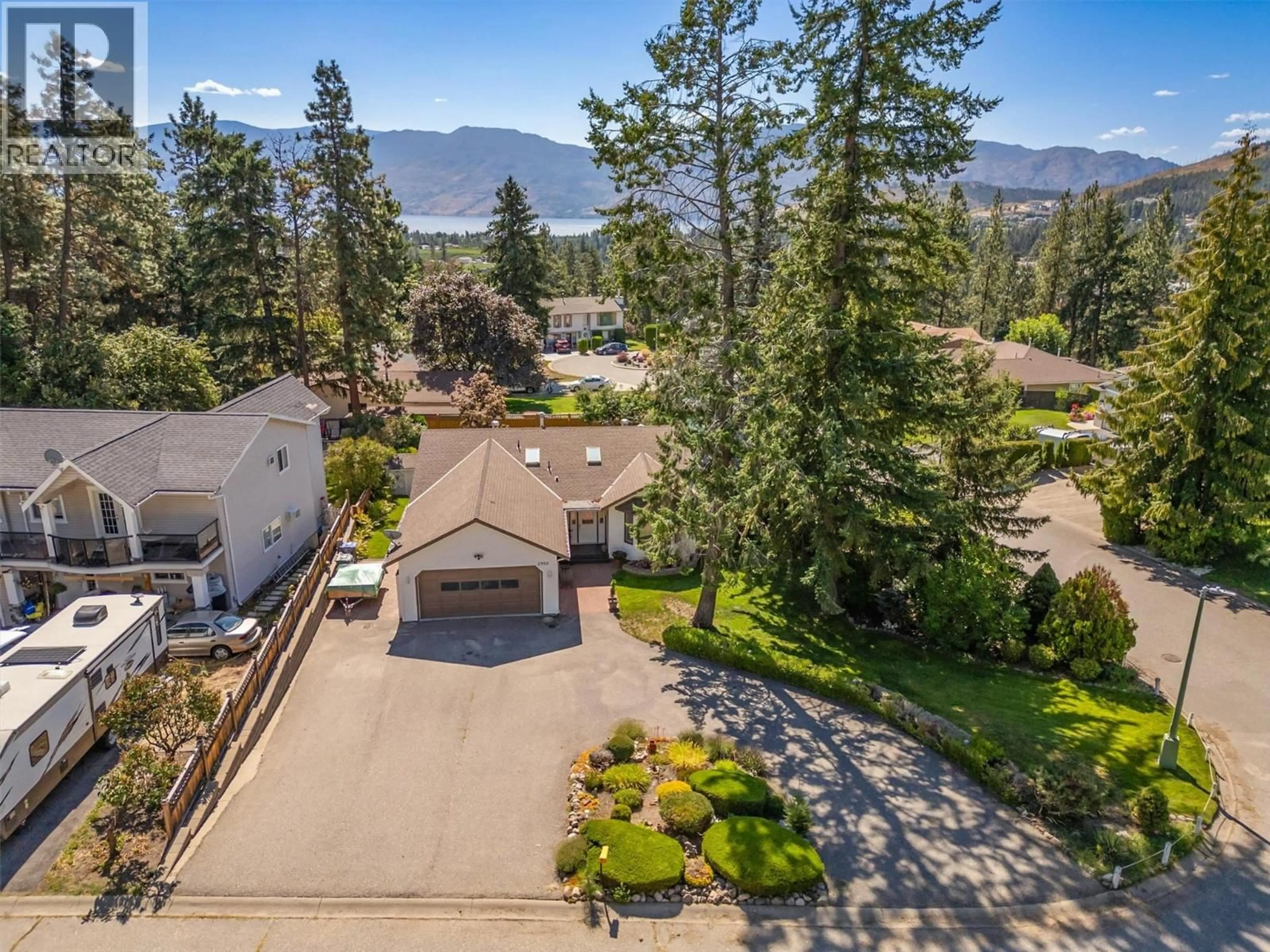 A pic from outside/outdoor area/front of a property/back of a property/a pic from drone, mountain view for 2952 SANDBERG ROAD, West Kelowna British Columbia V4T1M5