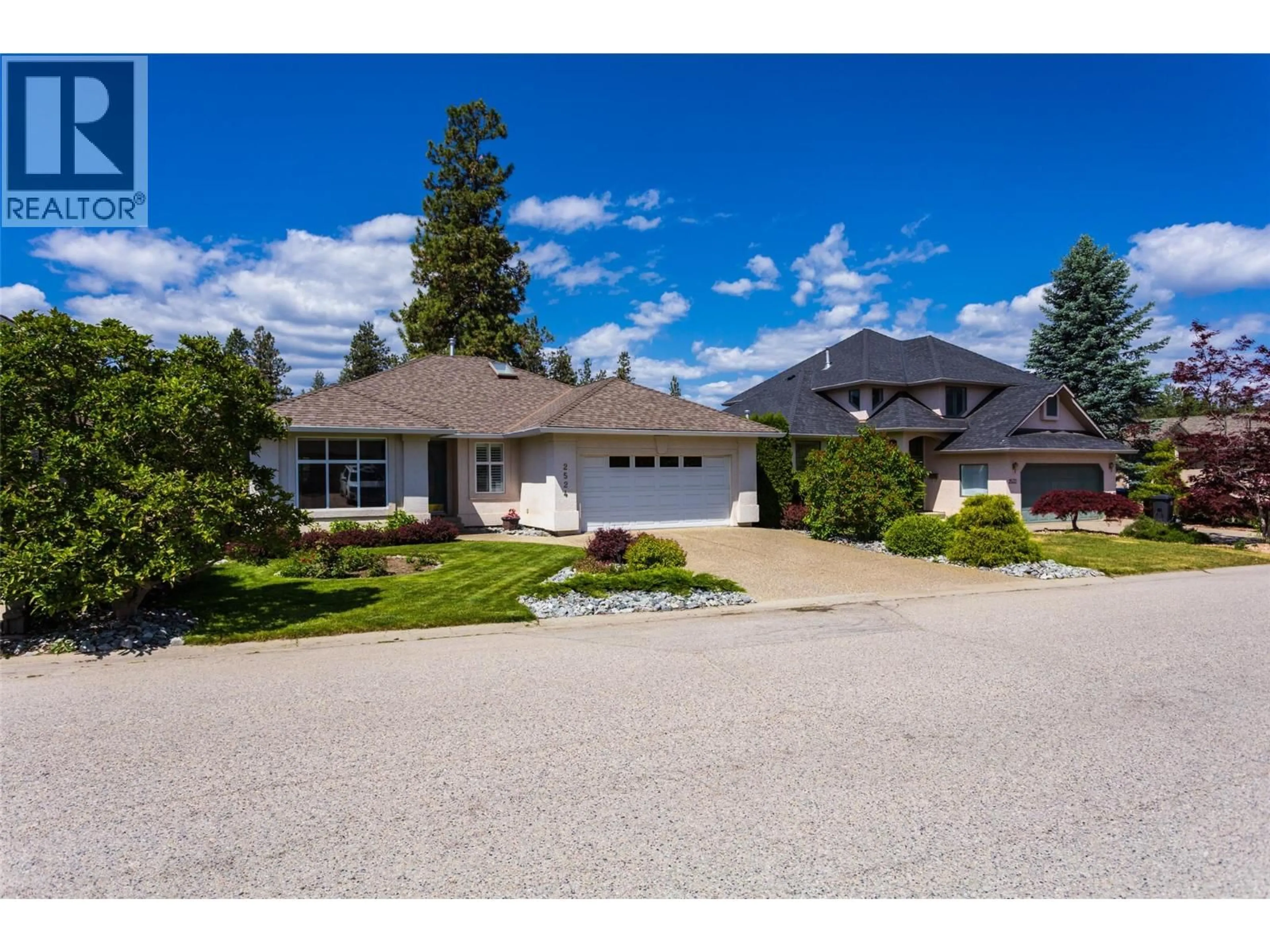 A pic from outside/outdoor area/front of a property/back of a property/a pic from drone, street for 2524 QUAIL LANE, Kelowna British Columbia V1V1Z9