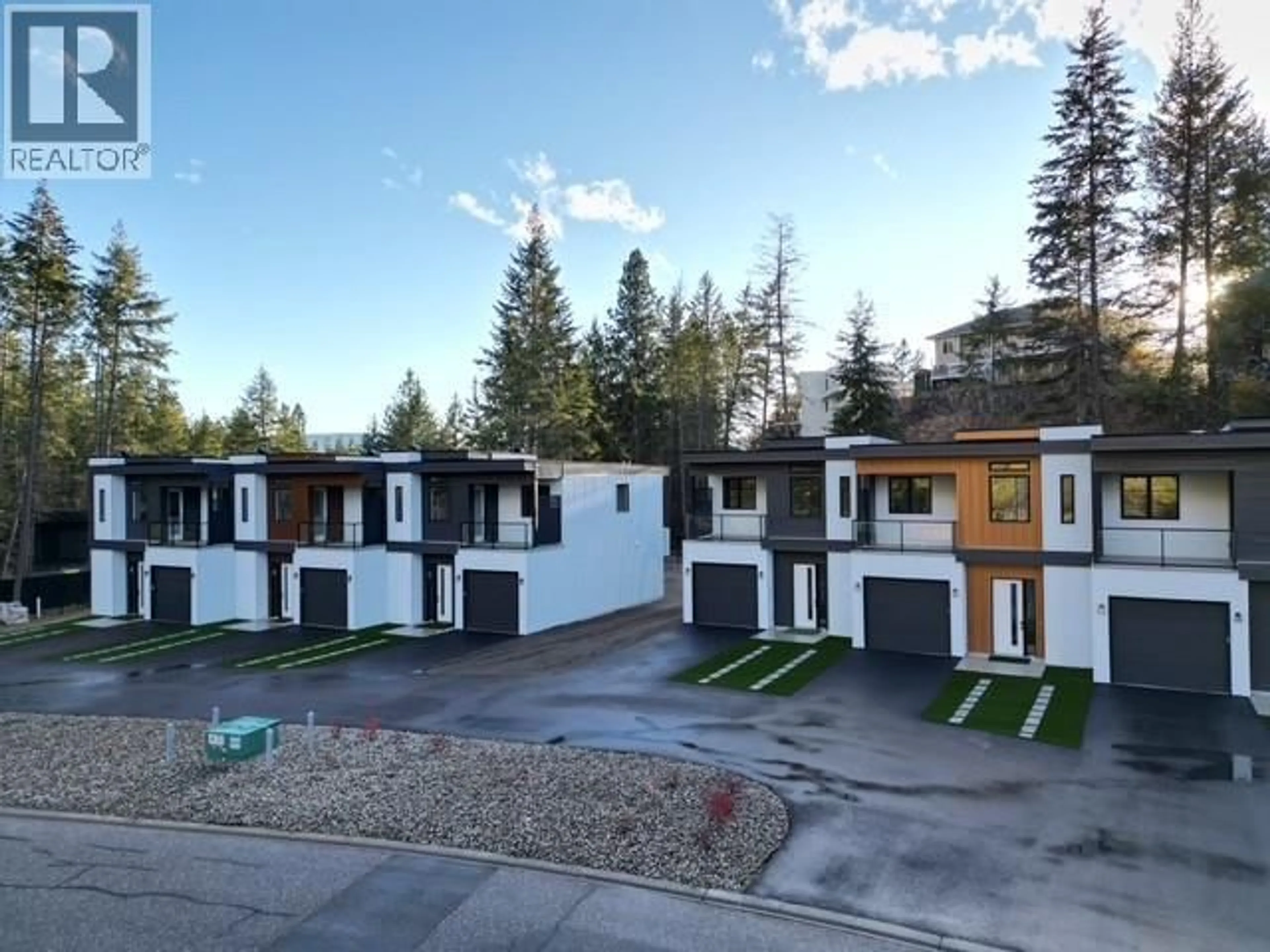 A pic from outside/outdoor area/front of a property/back of a property/a pic from drone, street for 5 - 9188 TRONSON ROAD, Vernon British Columbia V1H1E2
