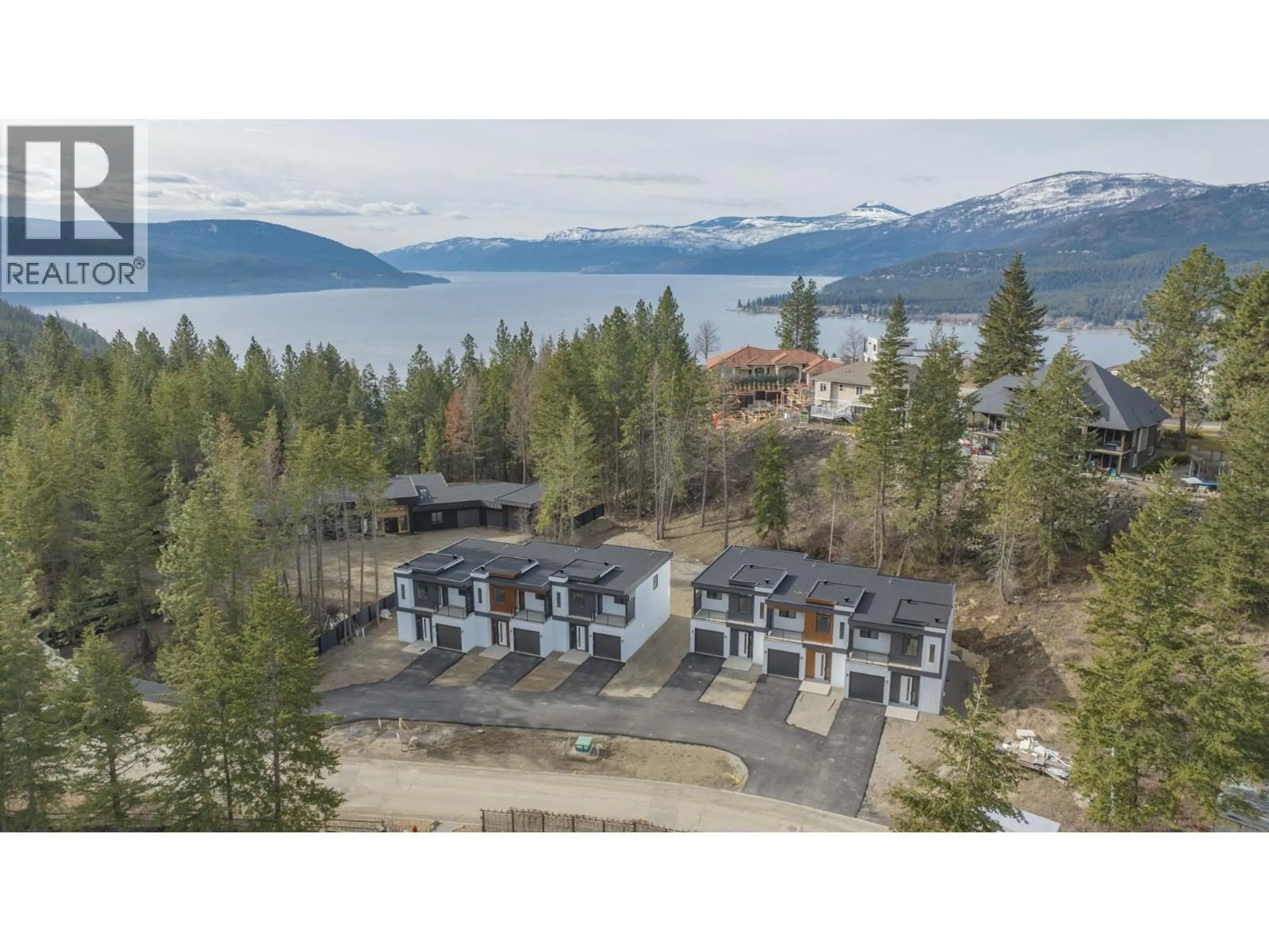 A pic from outside/outdoor area/front of a property/back of a property/a pic from drone, water/lake/river/ocean view for 6 - 9188 TRONSON ROAD, Vernon British Columbia V1H1E2