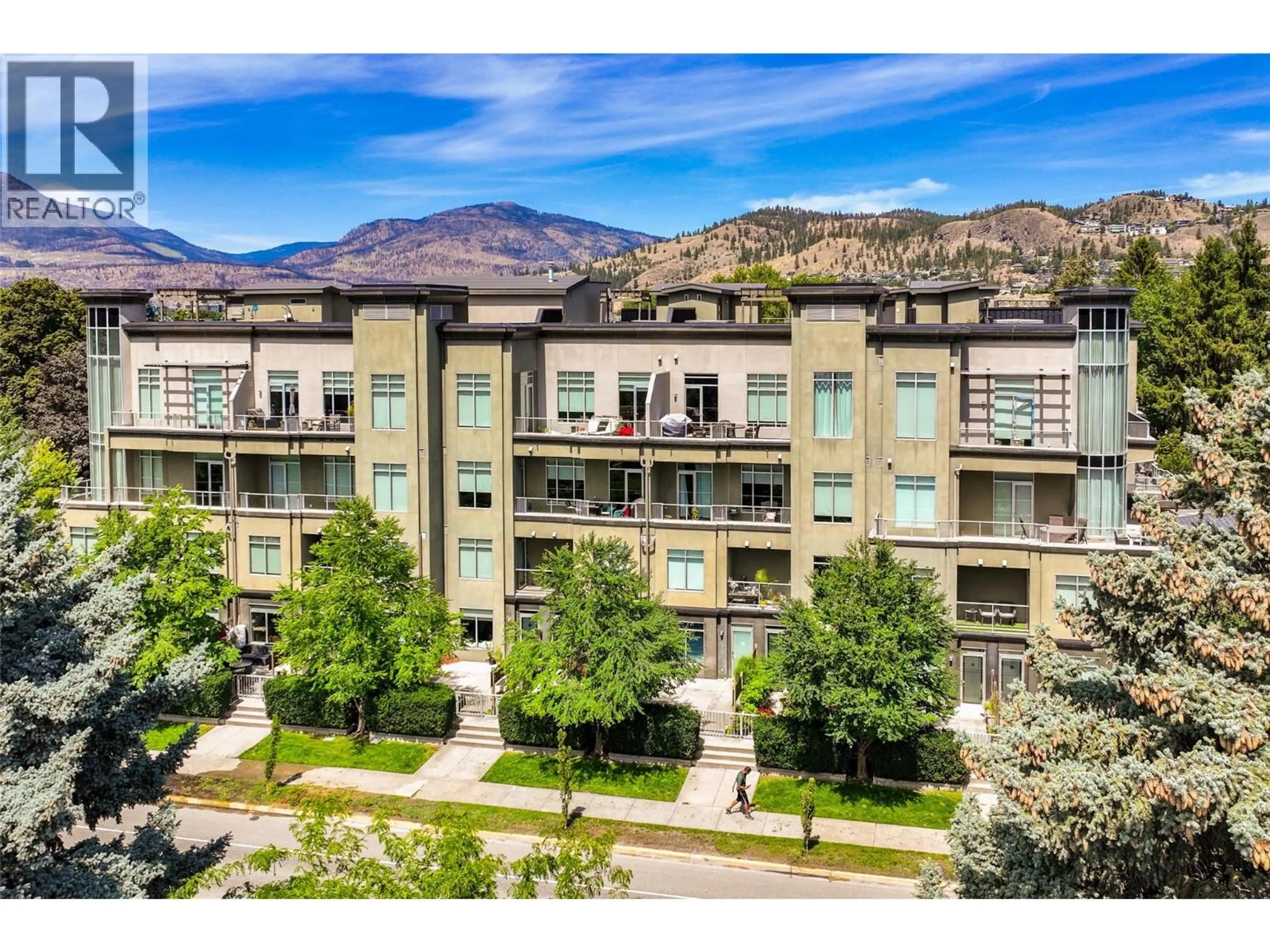 A pic from outside/outdoor area/front of a property/back of a property/a pic from drone, mountain view for 406 - 1495 GRAHAM STREET, Kelowna British Columbia V1Y3B2