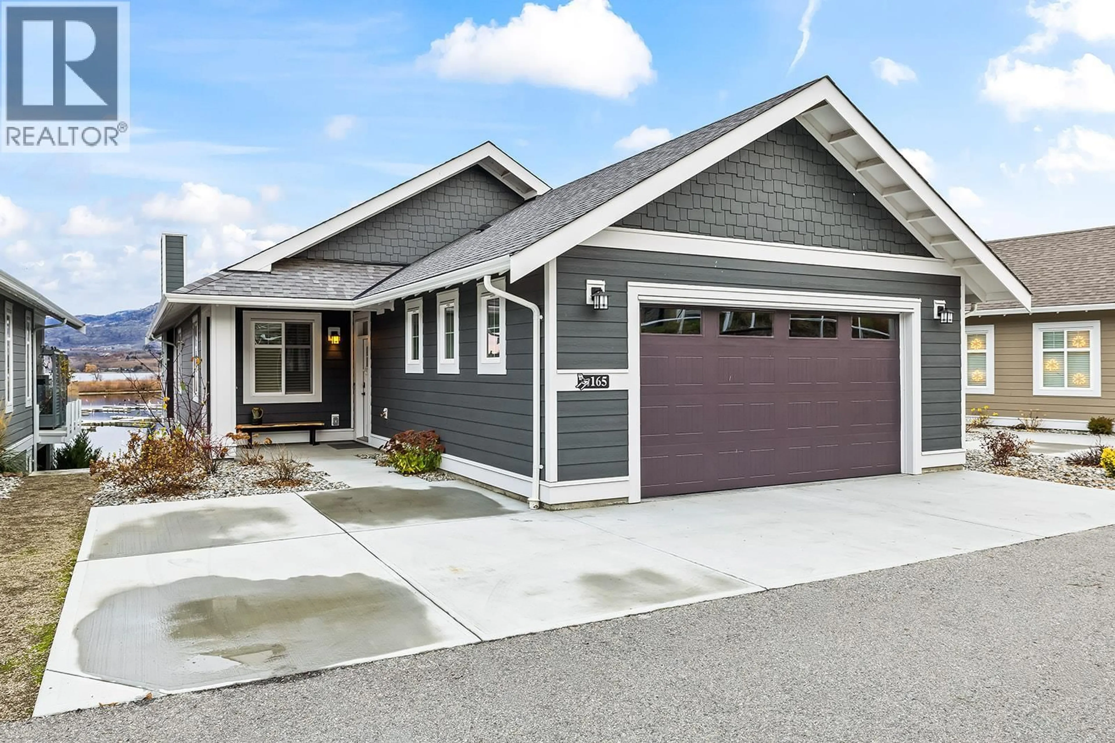 Home with vinyl exterior material, street for 165 - 2450 RADIO TOWER ROAD, Osoyoos British Columbia V0H1T1