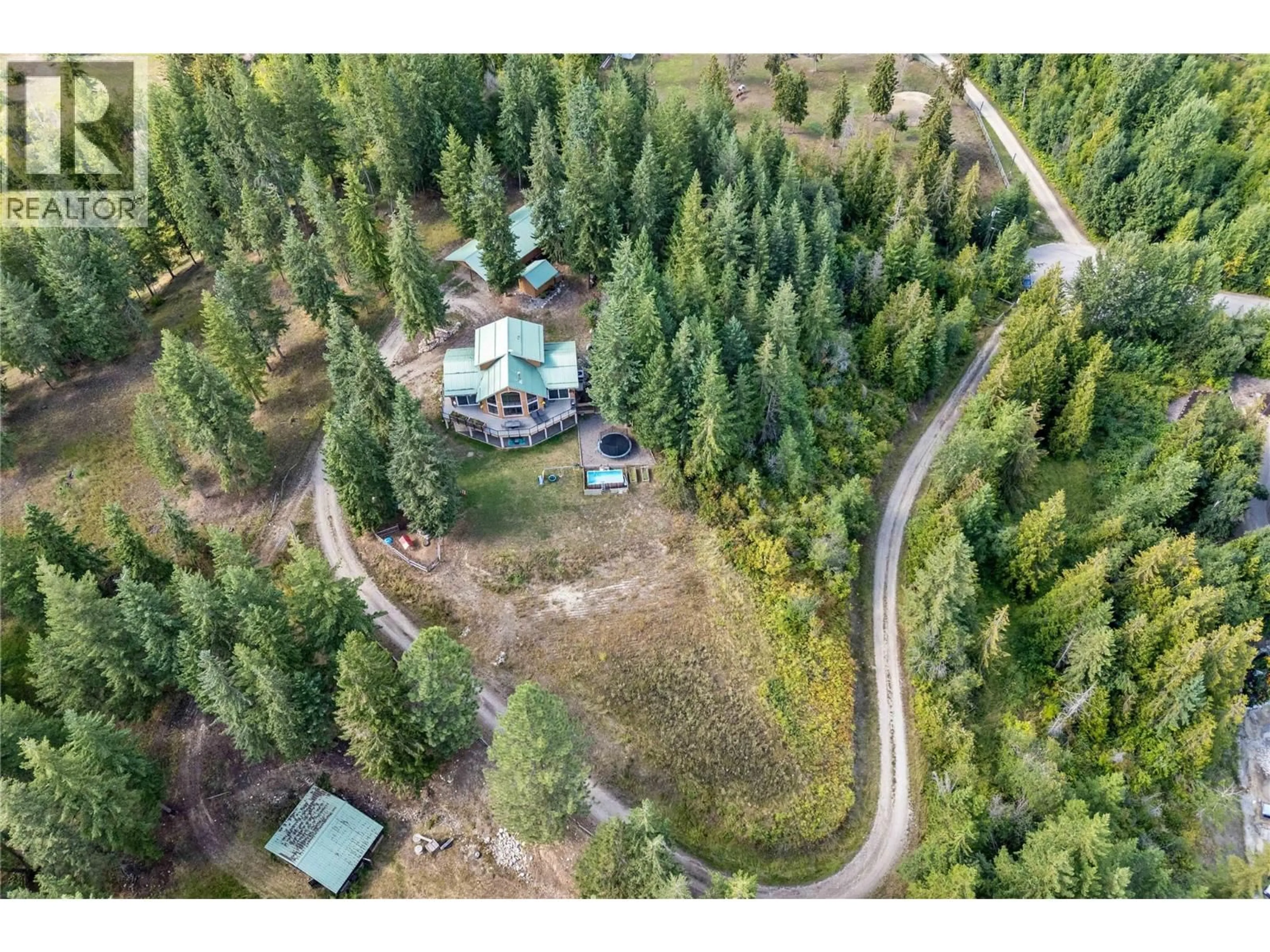 A pic from outside/outdoor area/front of a property/back of a property/a pic from drone, forest/trees view for 65 FURLONG ROAD, Enderby British Columbia V0E1V3
