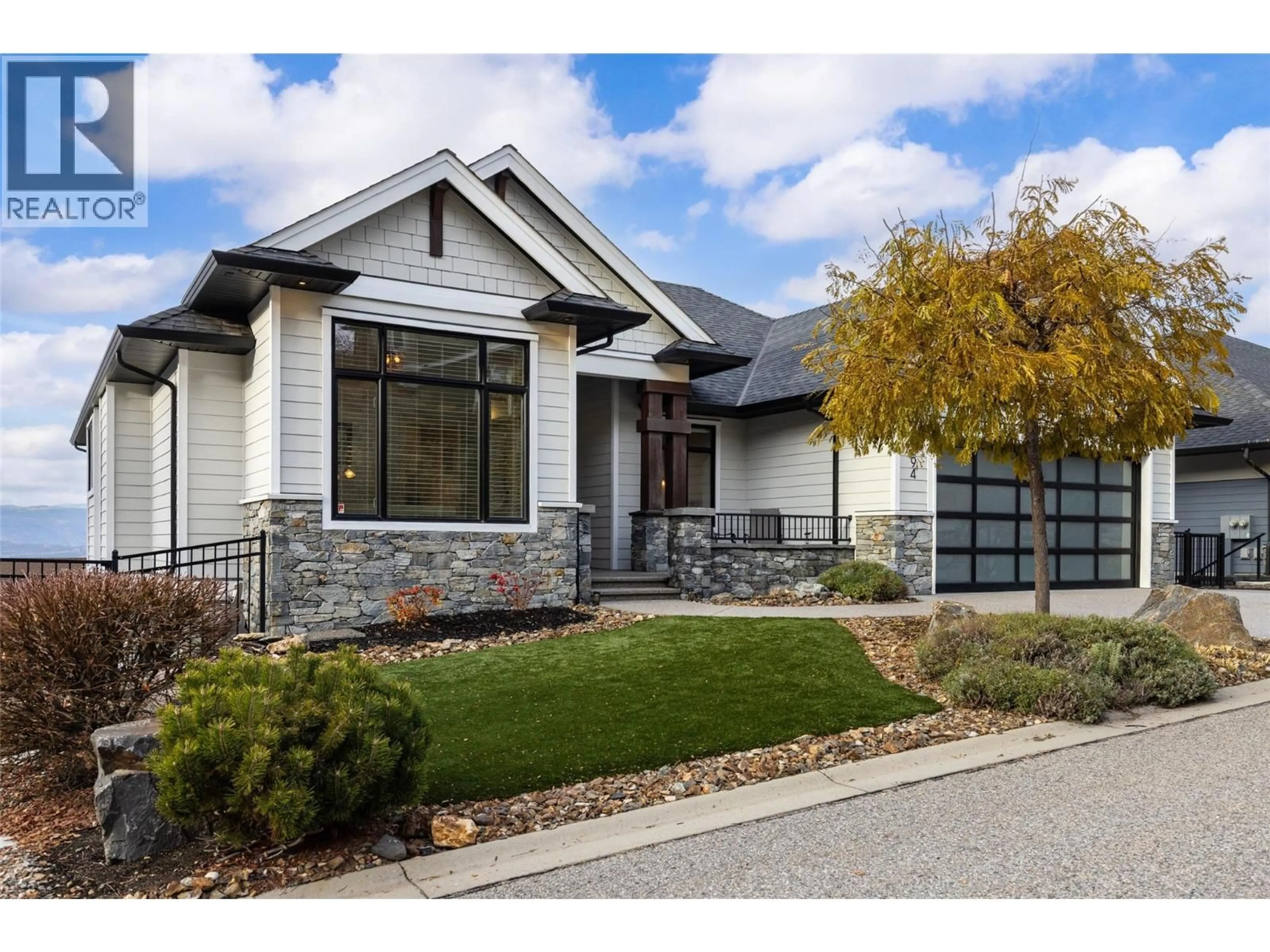 Home with brick exterior material, street for 394 PRESTWICK LANE, Kelowna British Columbia V1P1R7