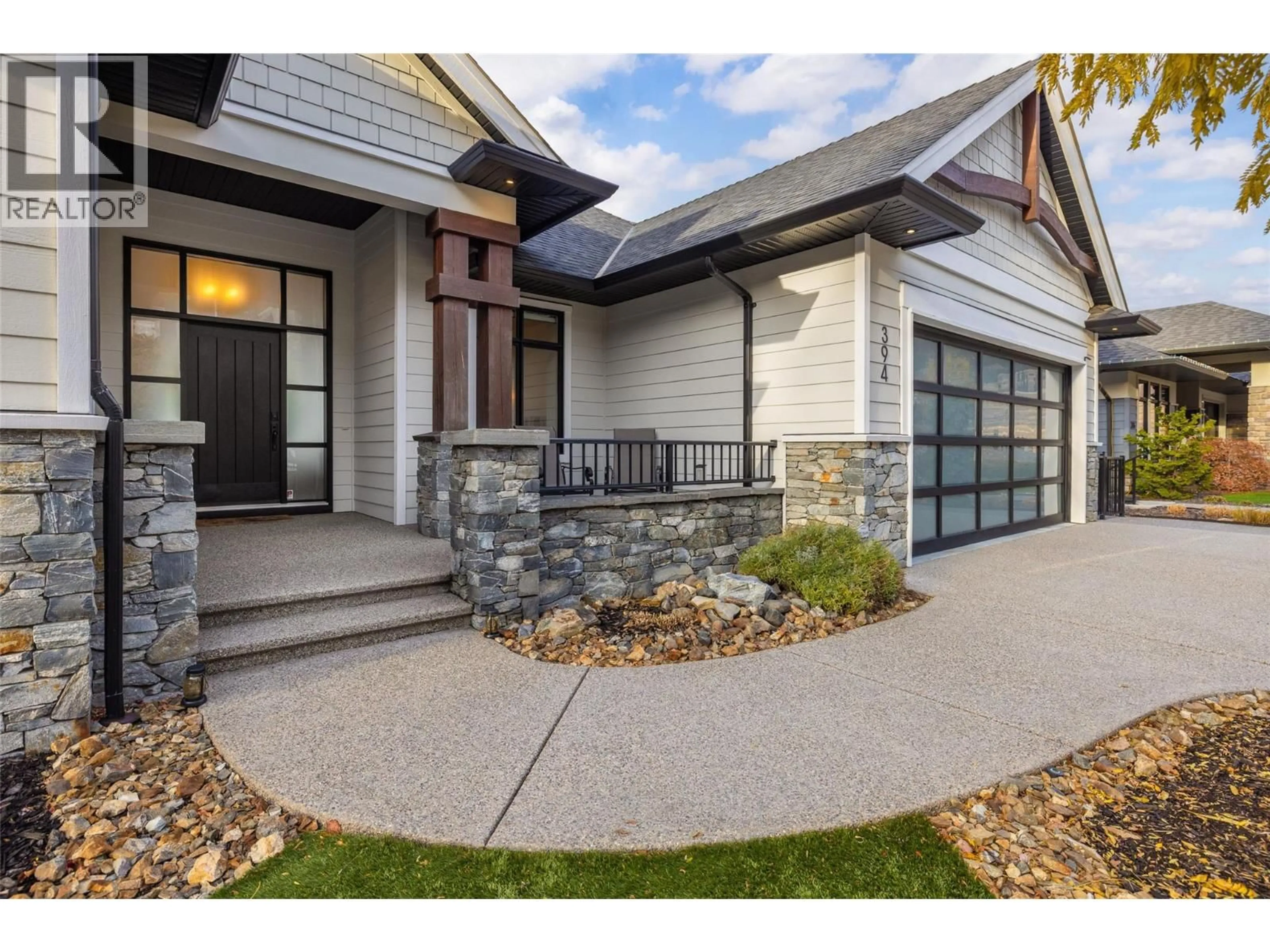 Home with brick exterior material, street for 394 PRESTWICK LANE, Kelowna British Columbia V1P1R7