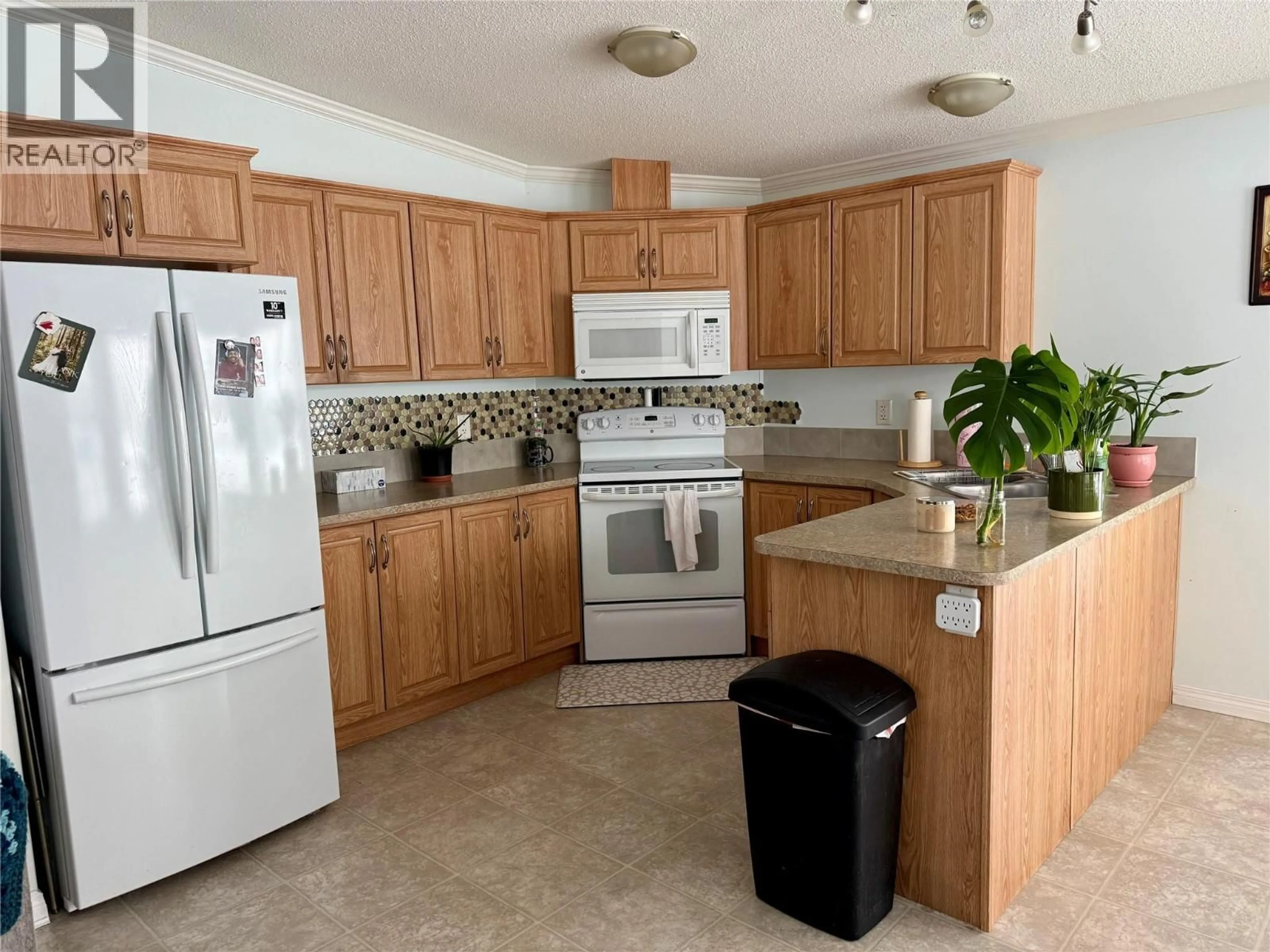Standard kitchen, ceramic/tile floor for 900 105 AVENUE, Dawson Creek British Columbia V1G2L1