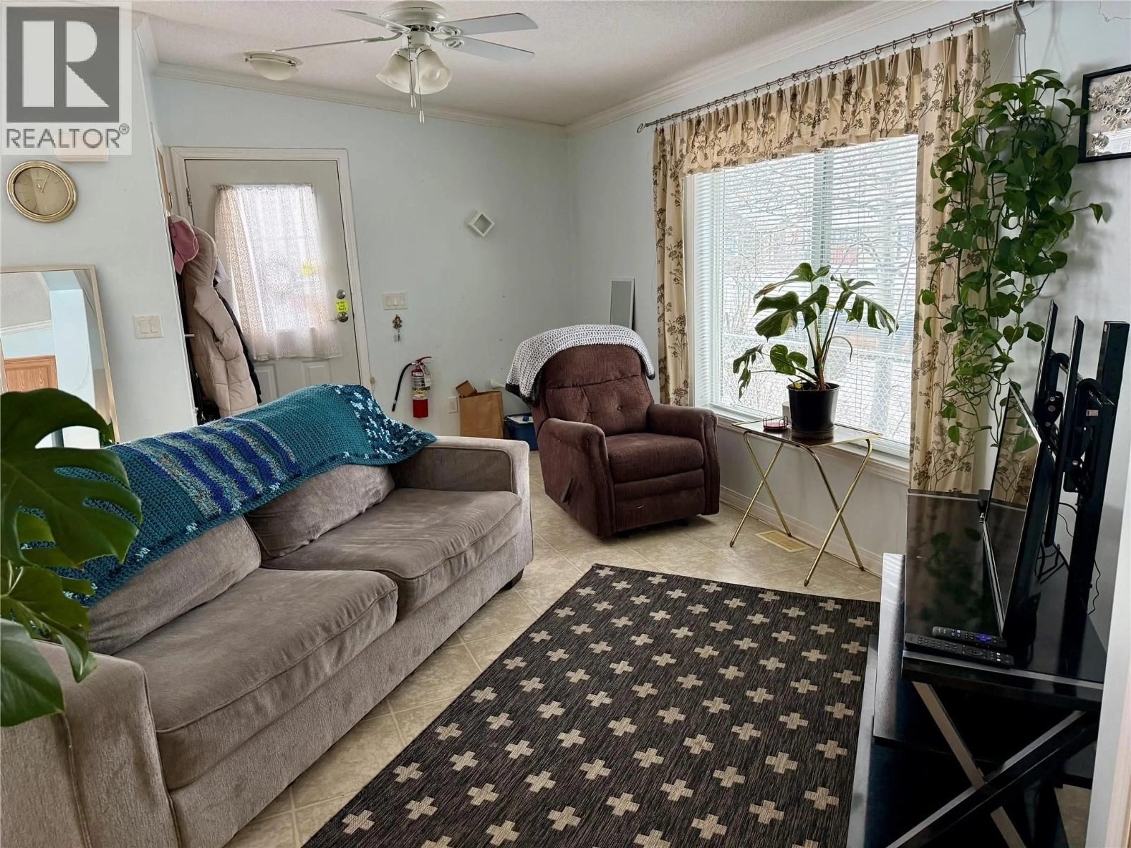 Living room with furniture, unknown for 900 105 AVENUE, Dawson Creek British Columbia V1G2L1