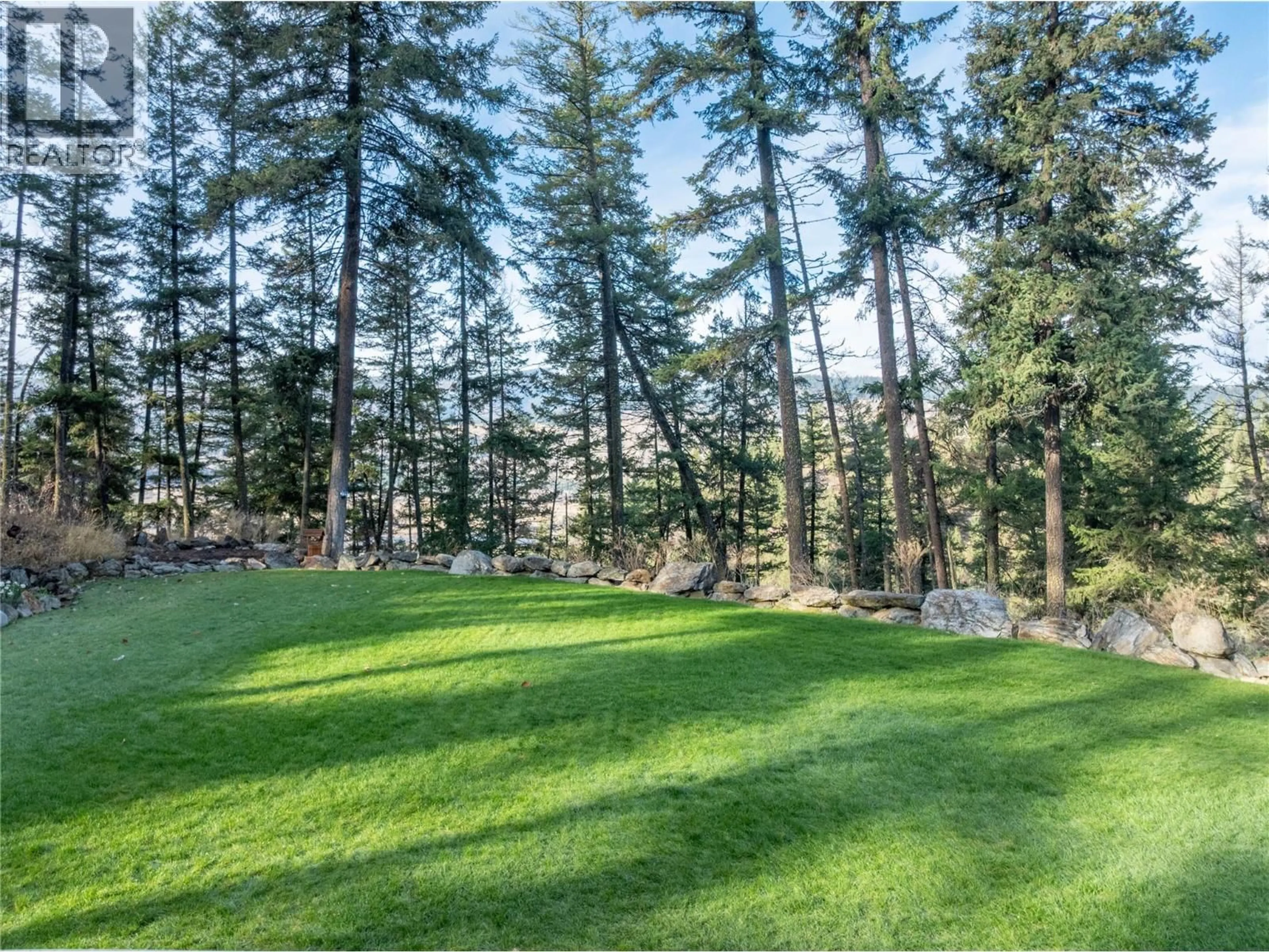 A pic from outside/outdoor area/front of a property/back of a property/a pic from drone, forest/trees view for 385 RIVERWIND DRIVE, Chase British Columbia V0E1M1