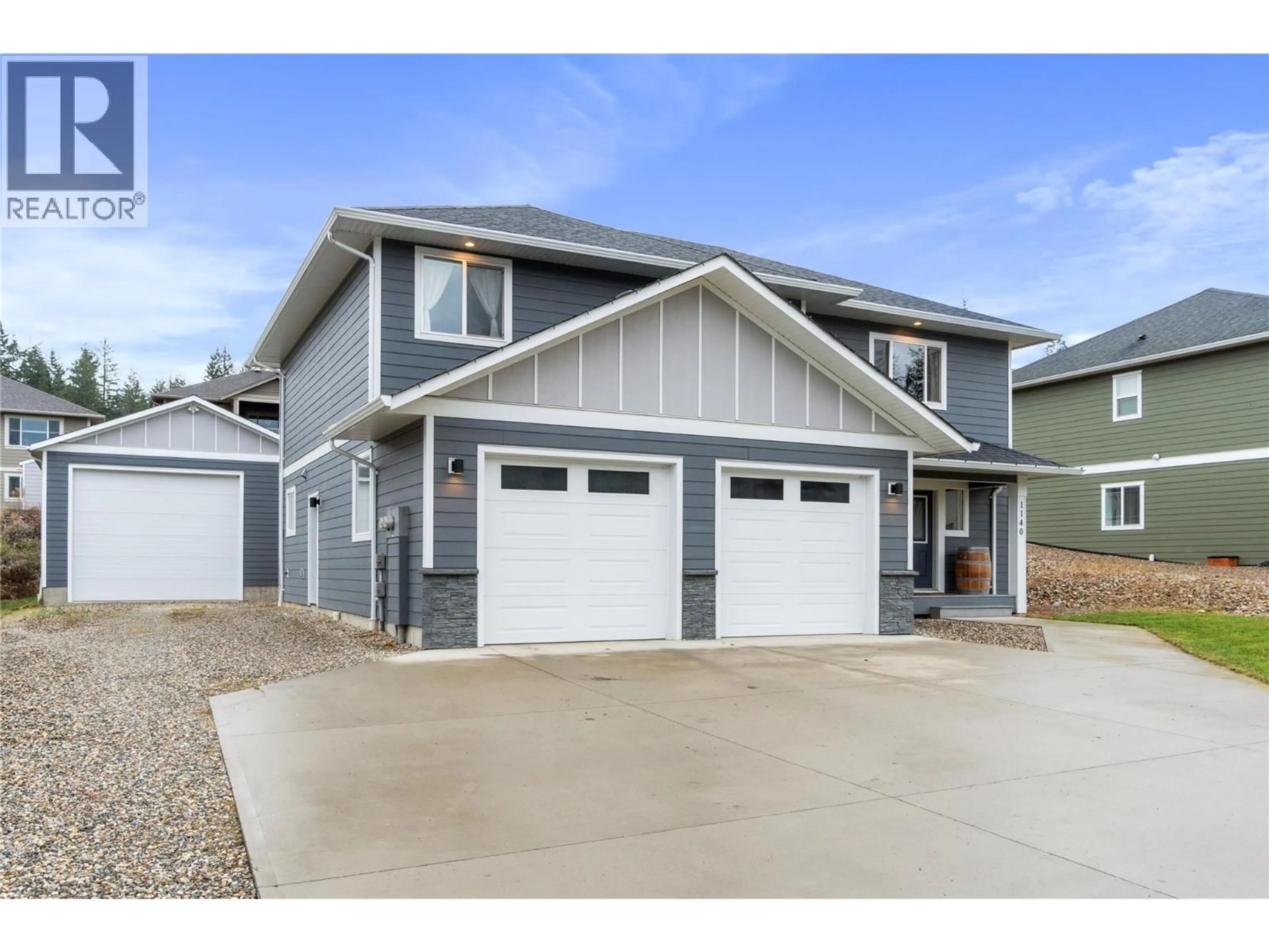 Home with vinyl exterior material, street for 1140 23 STREET SOUTHEAST, Salmon Arm British Columbia V1E0C7