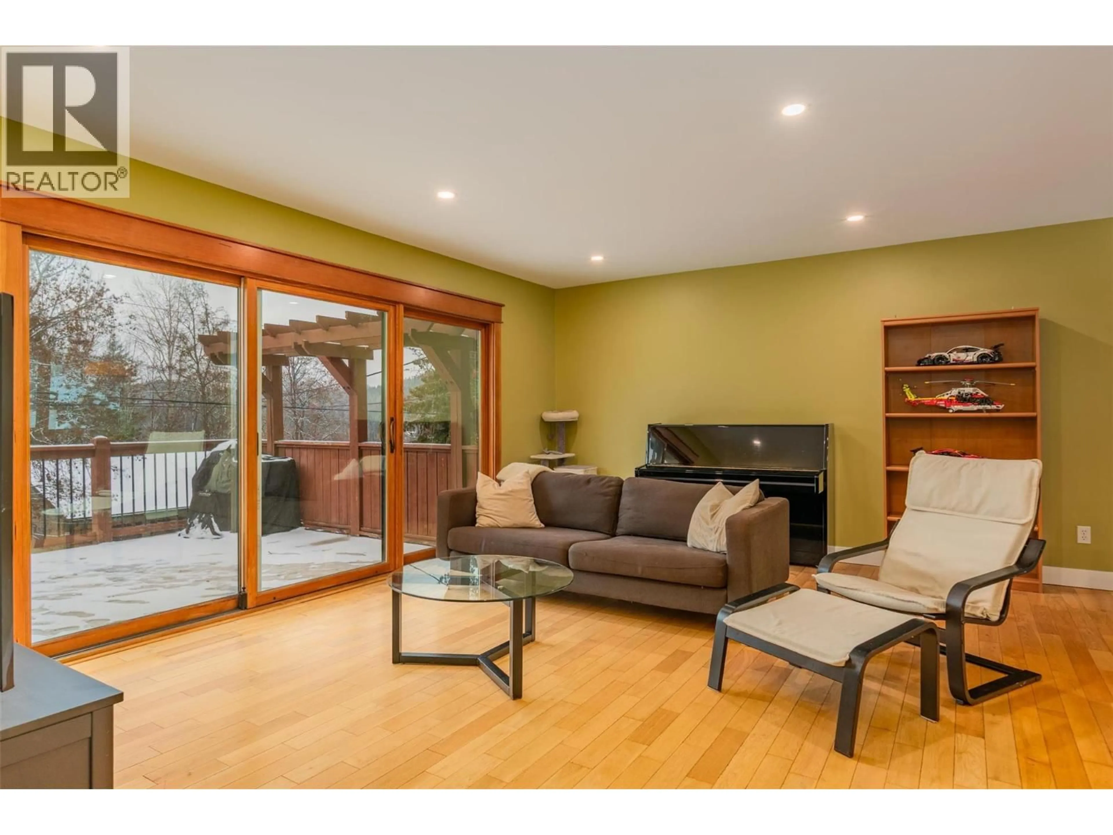 Living room with furniture, wood/laminate floor for 2520 COOK AVENUE, Rossland British Columbia V0G1Y0