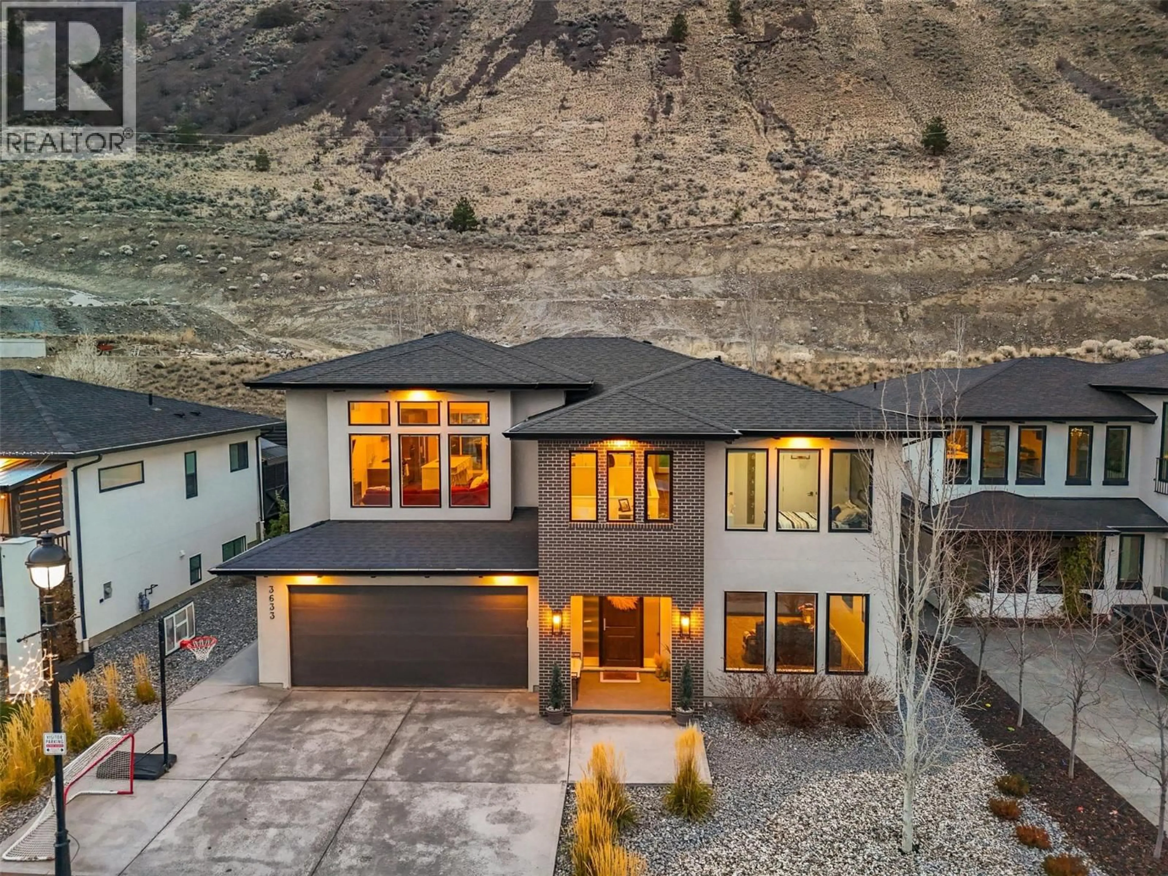 A pic from outside/outdoor area/front of a property/back of a property/a pic from drone, mountain view for 3633 SILLARO PLACE, Kamloops British Columbia V2H0G9