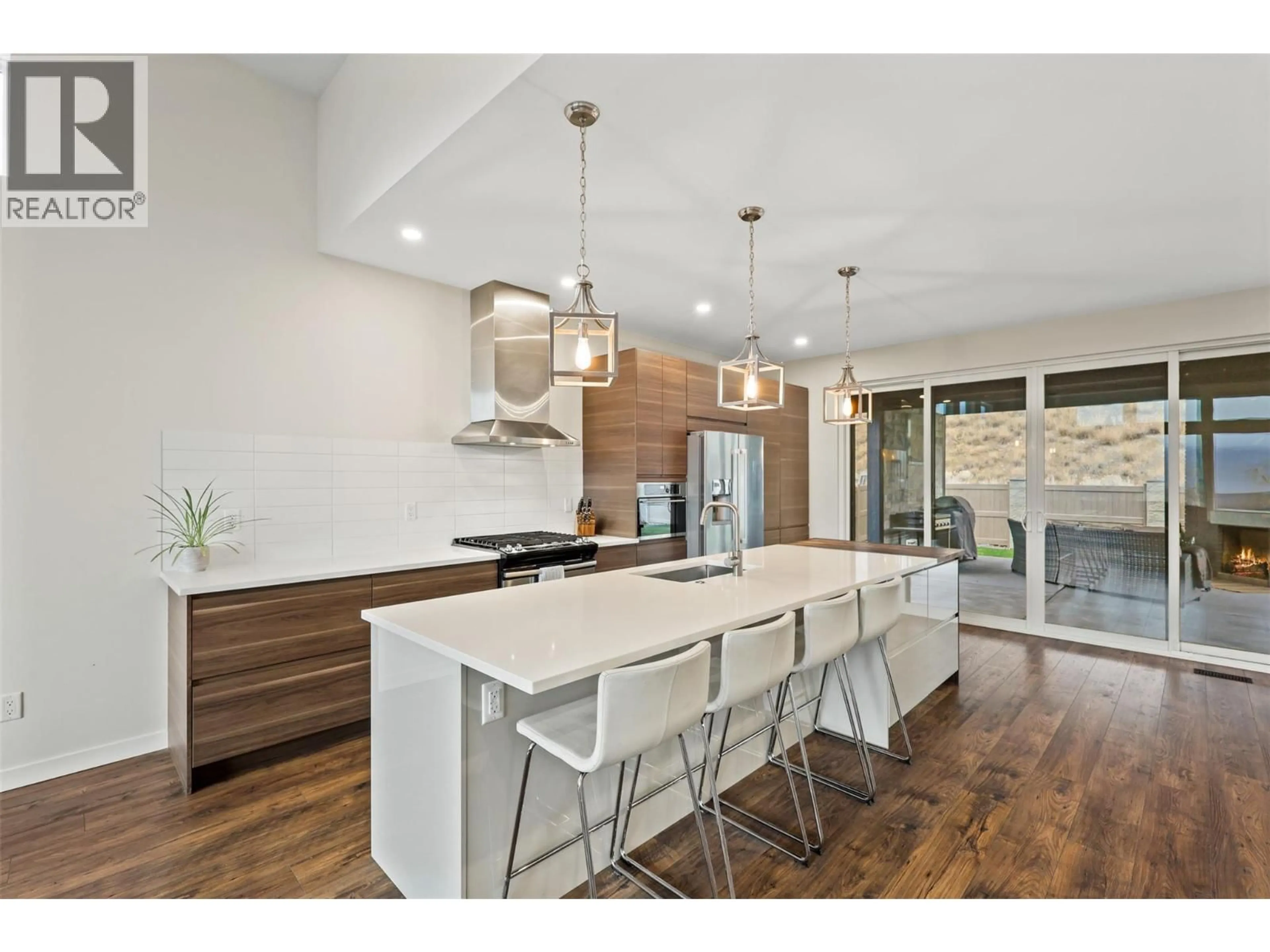 Open concept kitchen, wood/laminate floor for 3633 SILLARO PLACE, Kamloops British Columbia V2H0G9