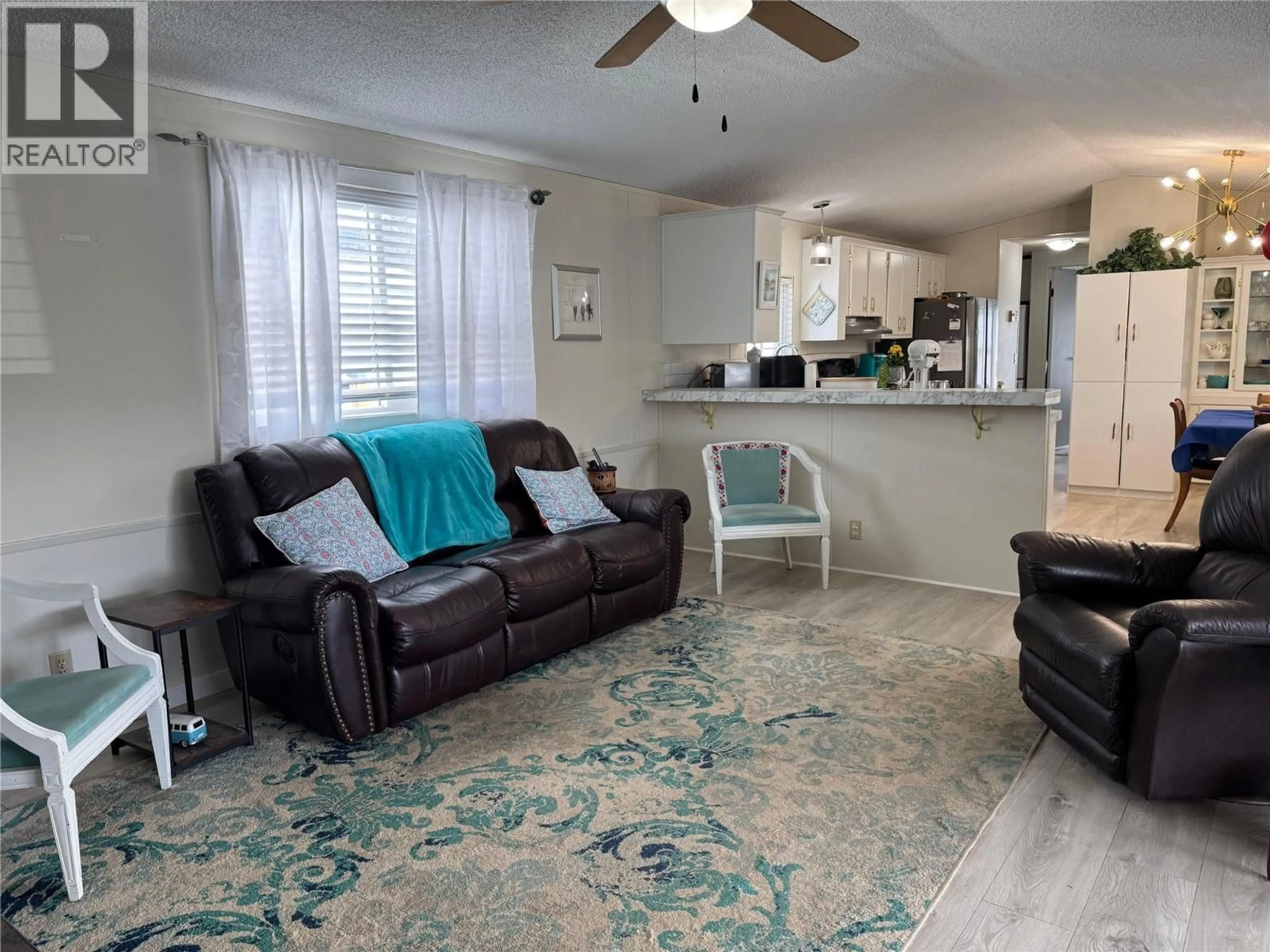 Living room with furniture, unknown for 222 - 720 COMMONWEALTH ROAD, Kelowna British Columbia V4V1S2