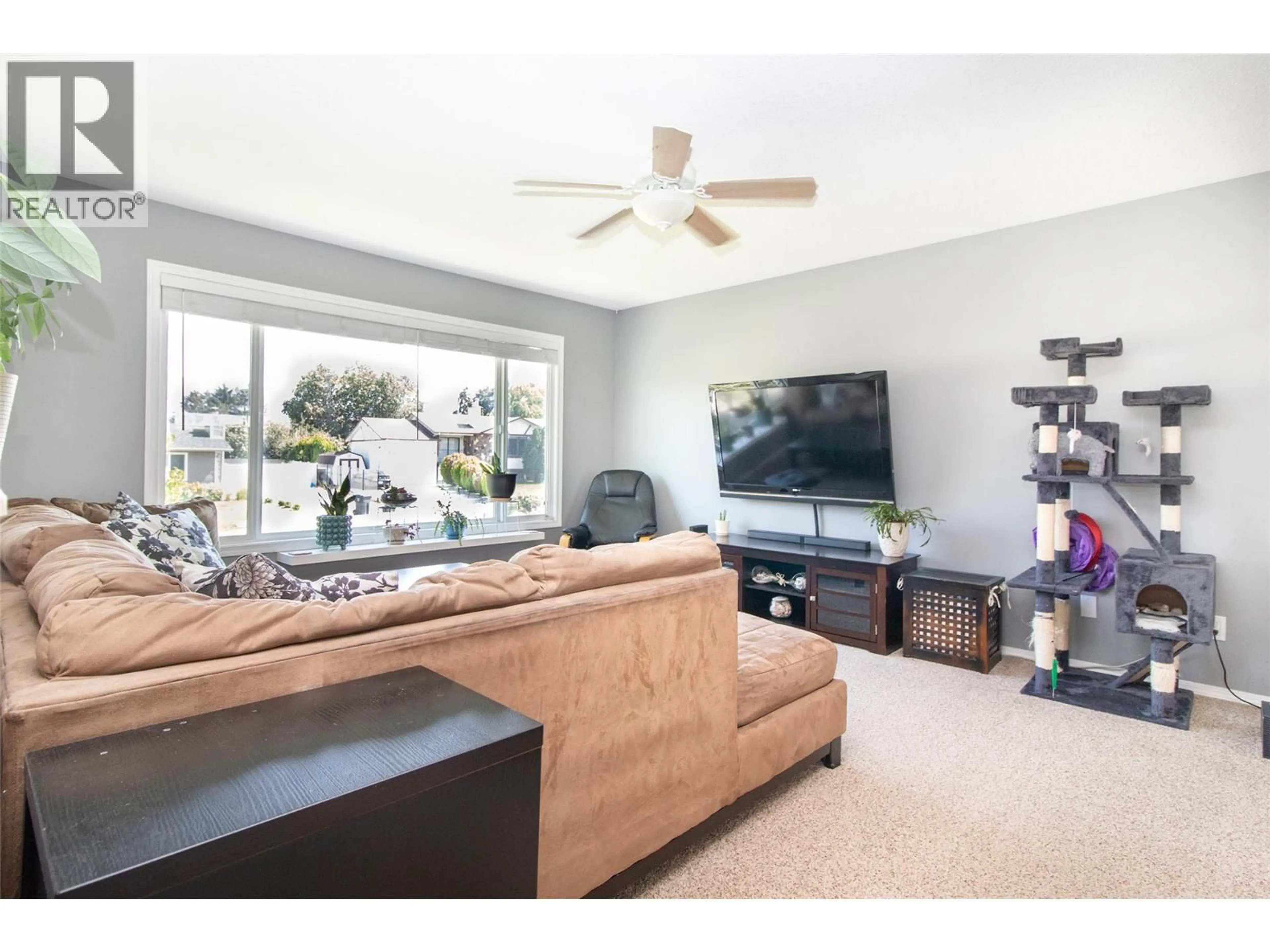 Living room with furniture, unknown for 1310 MARY COURT, Kelowna British Columbia V1X5V3