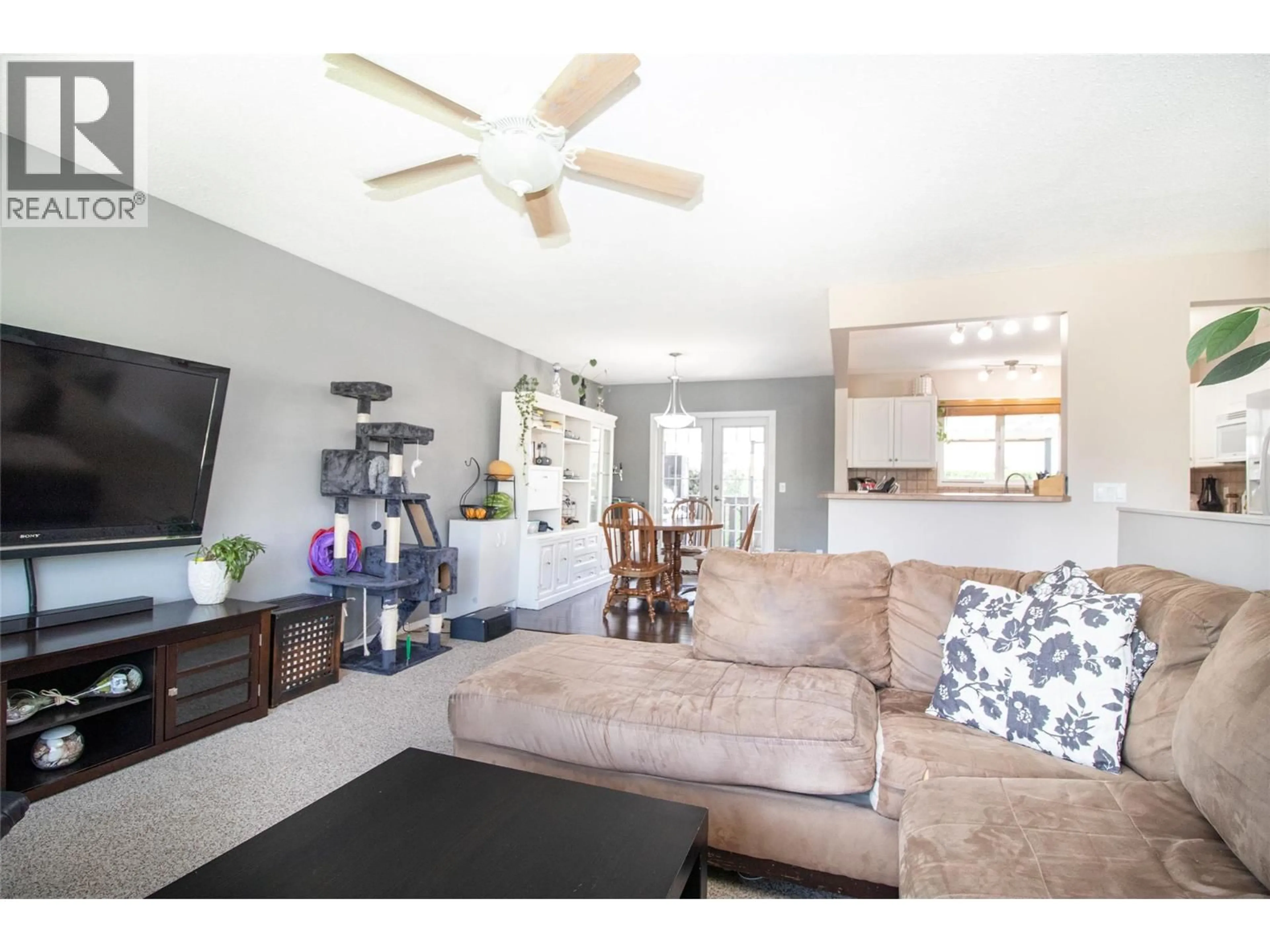 Living room with furniture, unknown for 1310 MARY COURT, Kelowna British Columbia V1X5V3