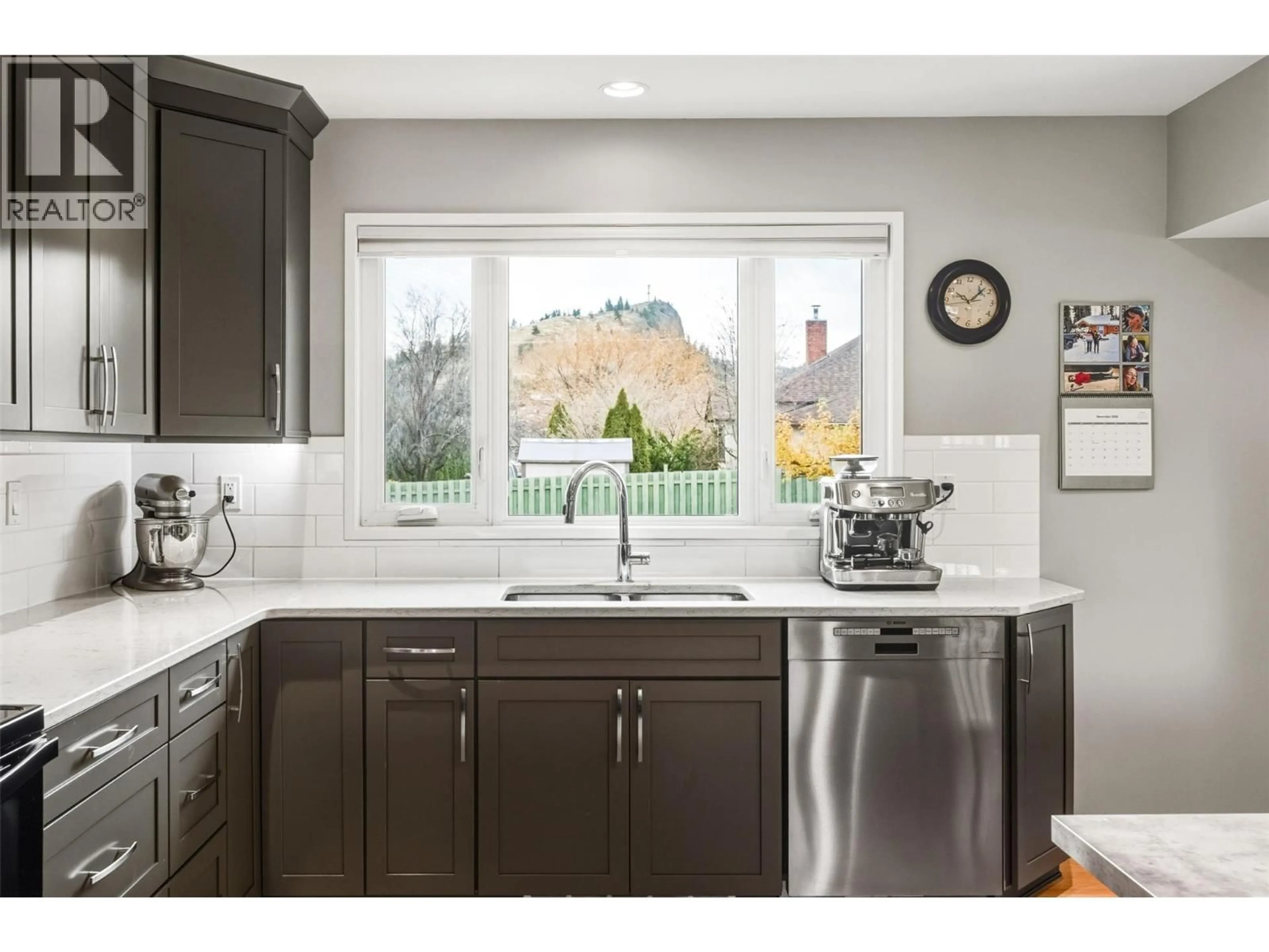 Open concept kitchen, ceramic/tile floor for 10915 WARD STREET, Summerland British Columbia V0H1Z0