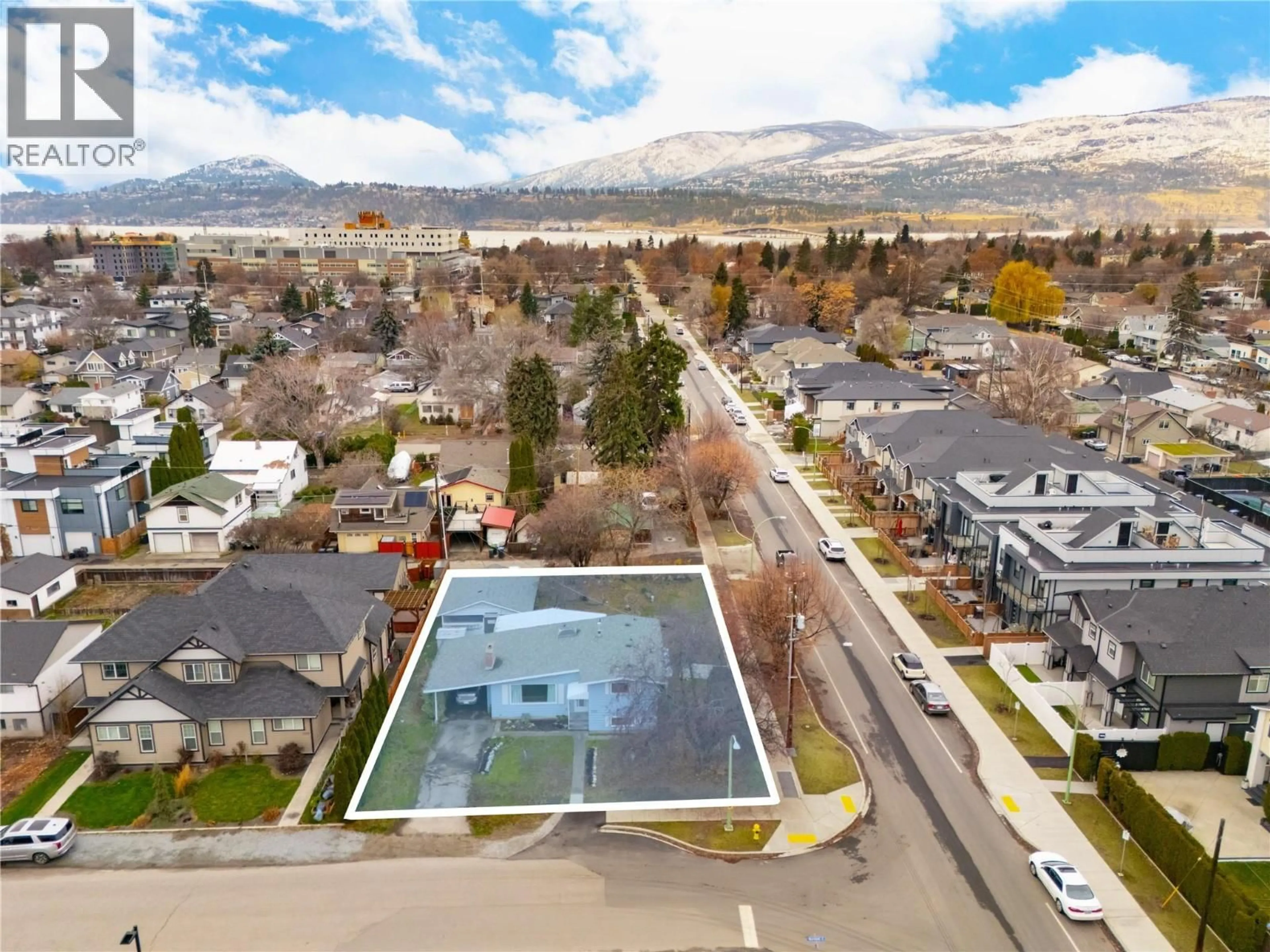 A pic from outside/outdoor area/front of a property/back of a property/a pic from drone, mountain view for 2150 BURNETT STREET, Kelowna British Columbia V1Y2T6