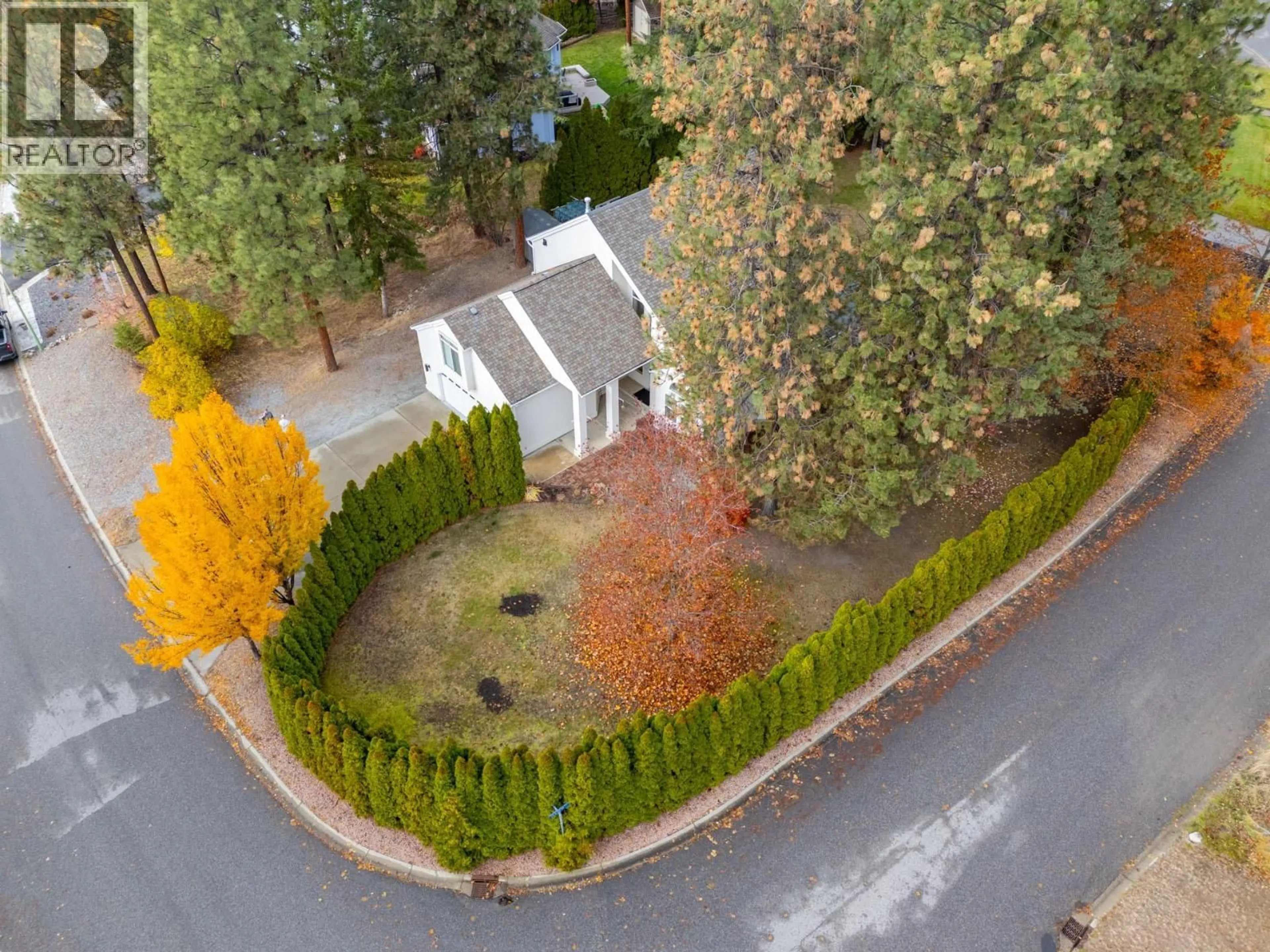 A pic from outside/outdoor area/front of a property/back of a property/a pic from drone, forest/trees view for 3932 LAKEVALE PLACE, Kelowna British Columbia V1W3Z5