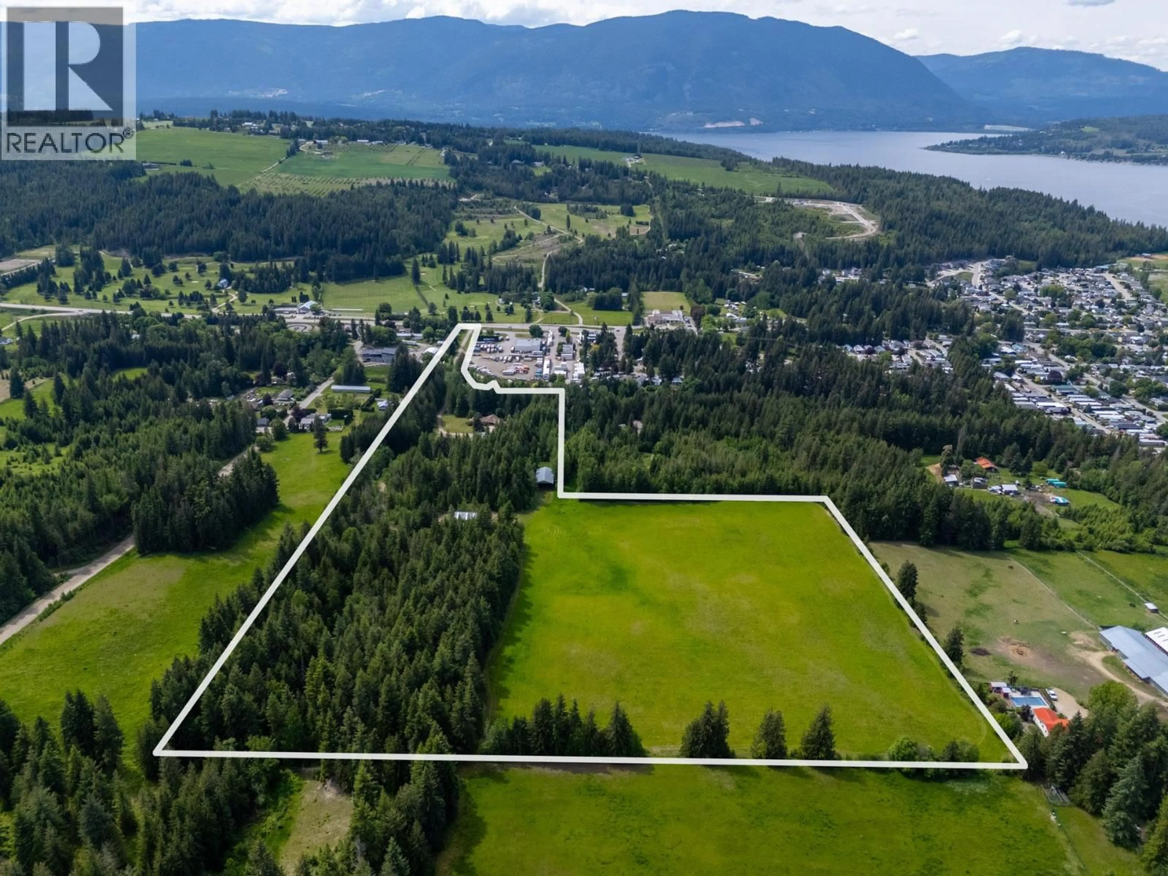 A pic from outside/outdoor area/front of a property/back of a property/a pic from drone, mountain view for 6210 50 STREET NORTHEAST, Salmon Arm British Columbia V1E3A6
