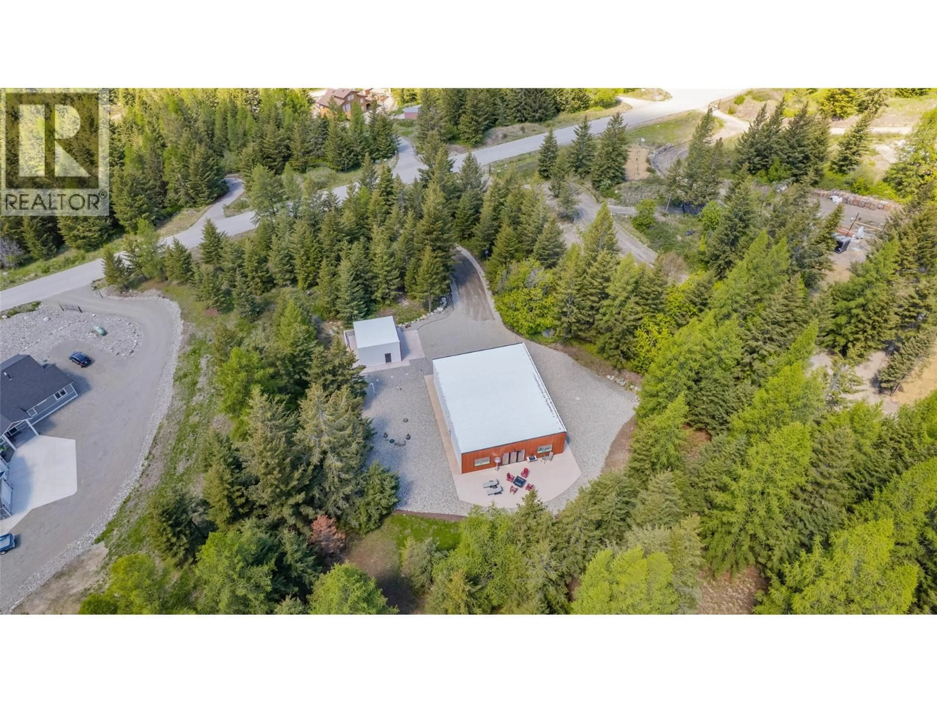 A pic from outside/outdoor area/front of a property/back of a property/a pic from drone, forest/trees view for 1324 TIMBERWOLF TRAIL ROAD, Bridesville British Columbia V0H1Y0