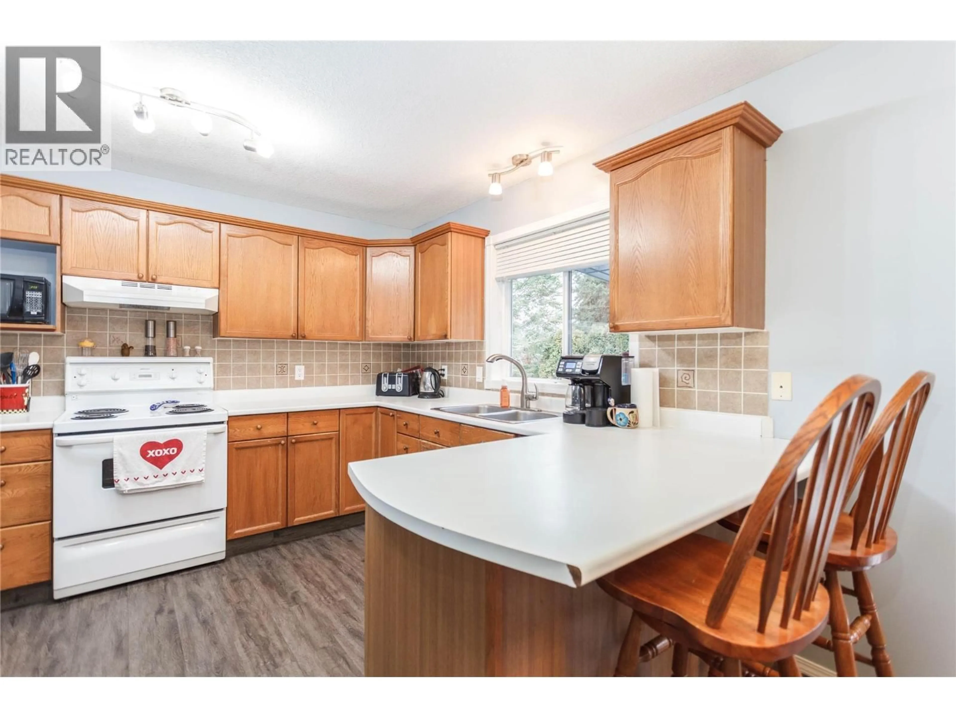 Open concept kitchen, unknown for 2230 LINEA CRESCENT, Lumby British Columbia V0E2G0