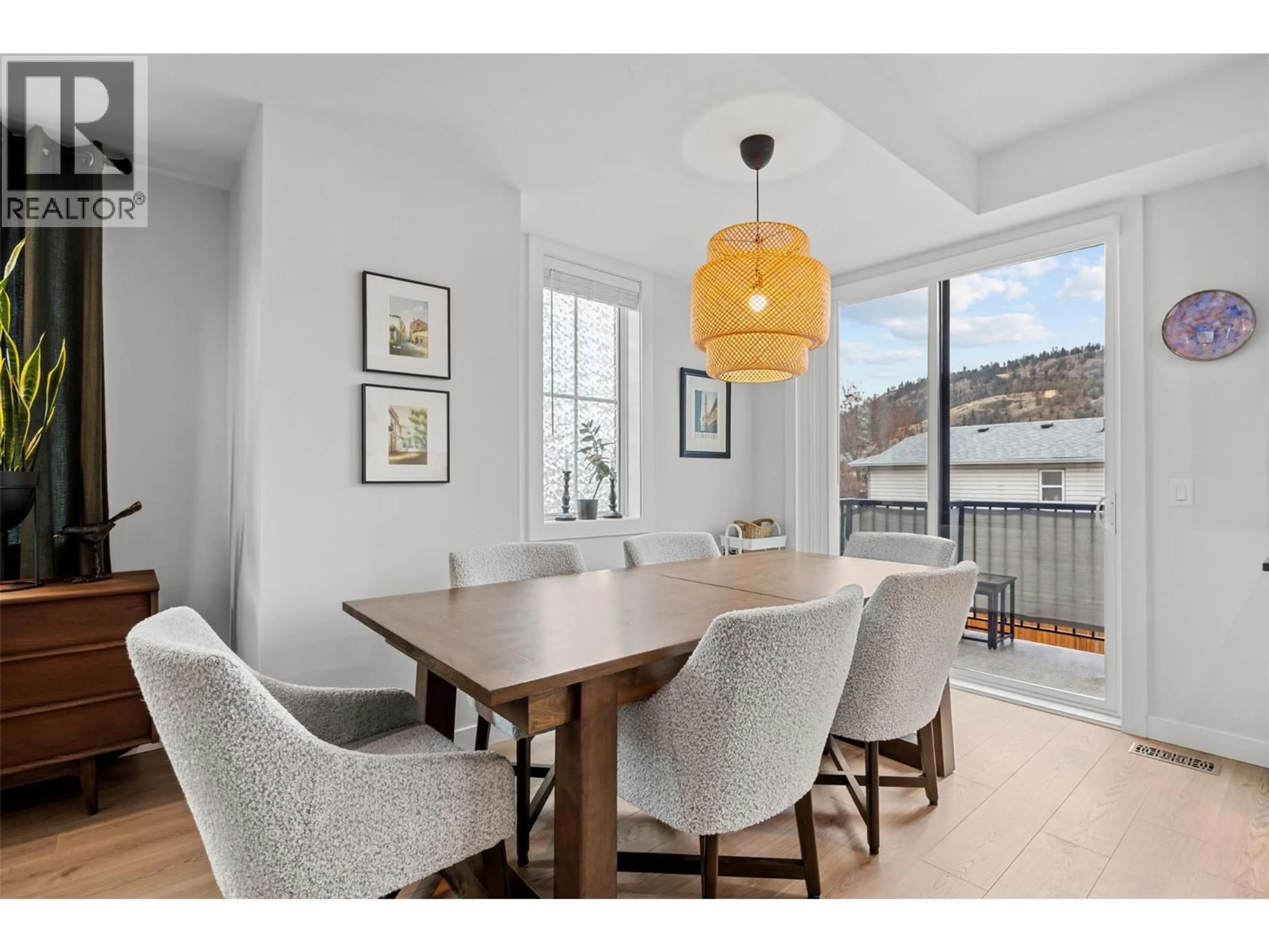 Dining room, wood/laminate floor for 48 - 307 GLEN PARK DRIVE, Kelowna British Columbia V1V0H1