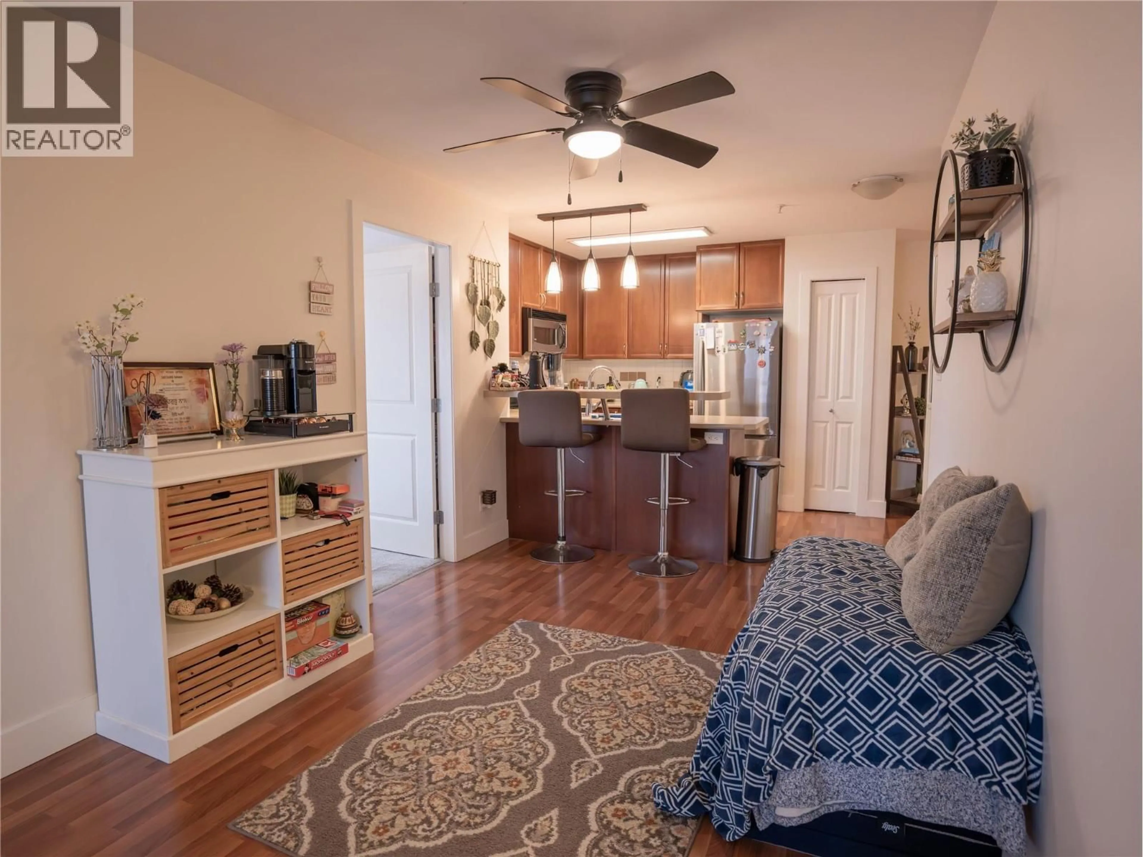 Open concept kitchen, wood/laminate floor for 315 - 246 HASTINGS AVENUE, Penticton British Columbia V2A2V6