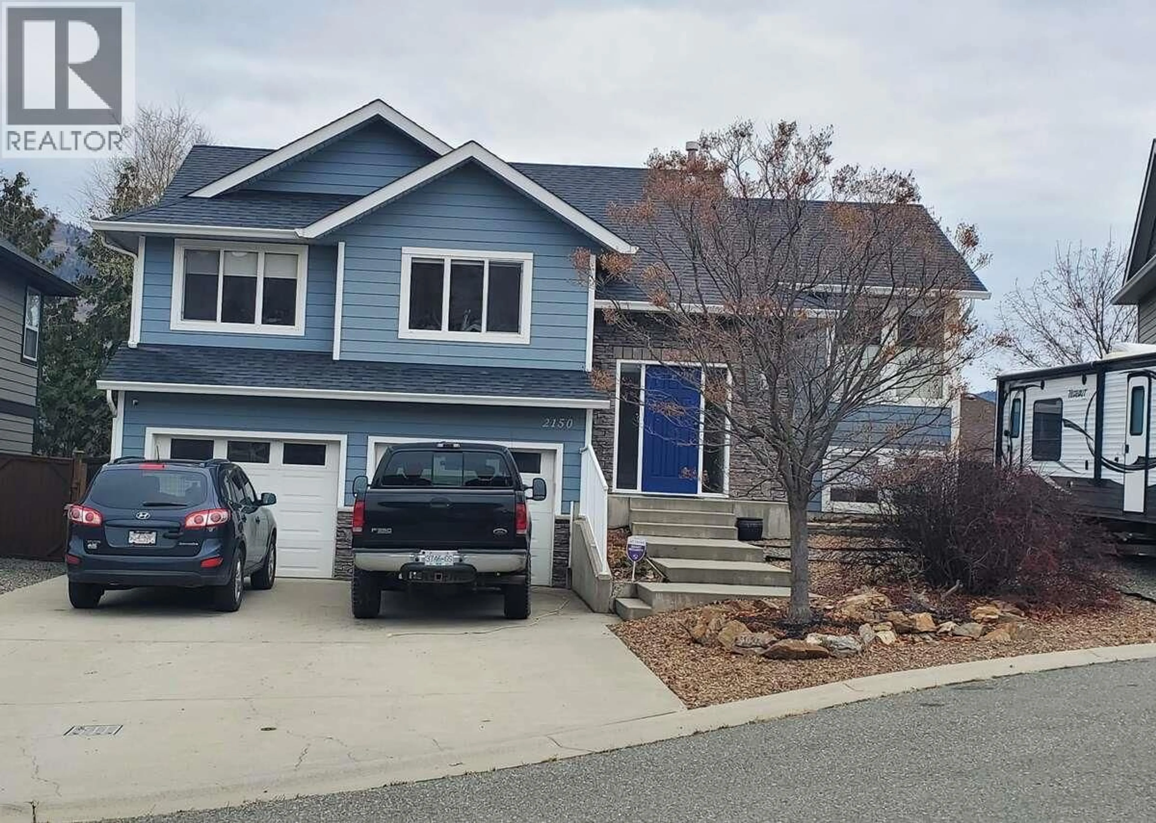 Home with vinyl exterior material, street for 2150 CANTLE PLACE, Kamloops British Columbia V2B0A7