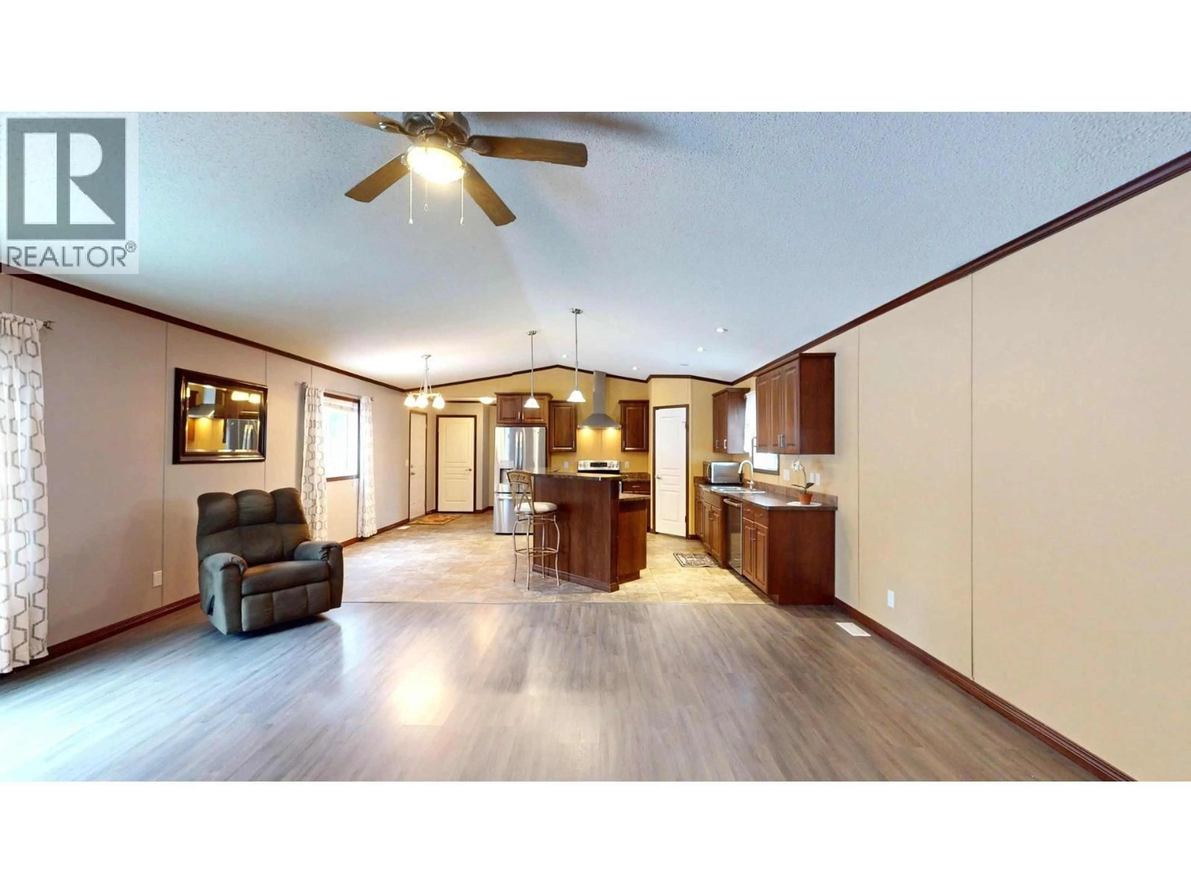 Open concept kitchen, wood/laminate floor for 35 WILDERNESS HEIGHTS WAY, Elkford British Columbia V0B1H0