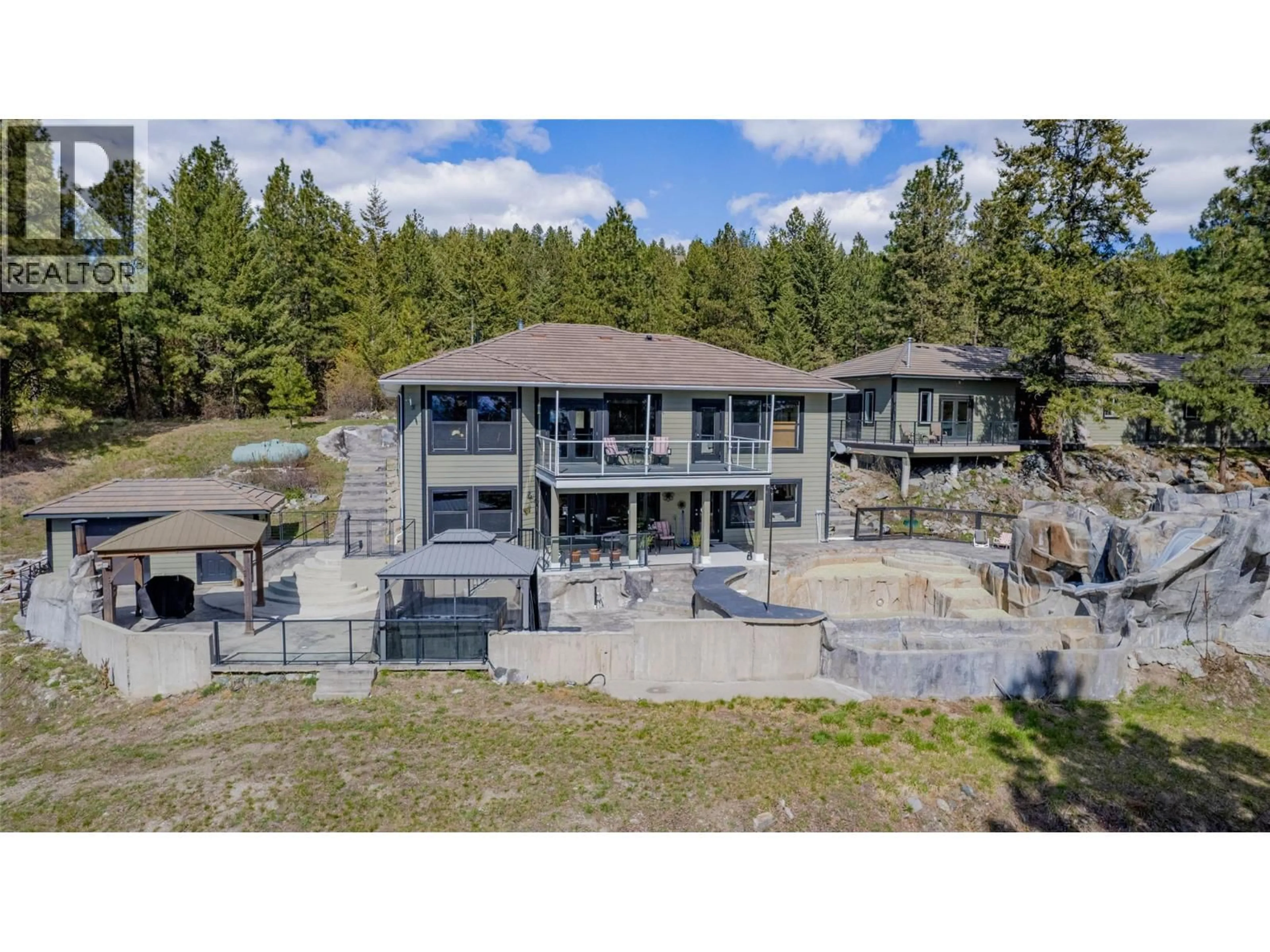 A pic from outside/outdoor area/front of a property/back of a property/a pic from drone, unknown for 1370 BULLMOOSE WAY, Osoyoos British Columbia V0H1V6