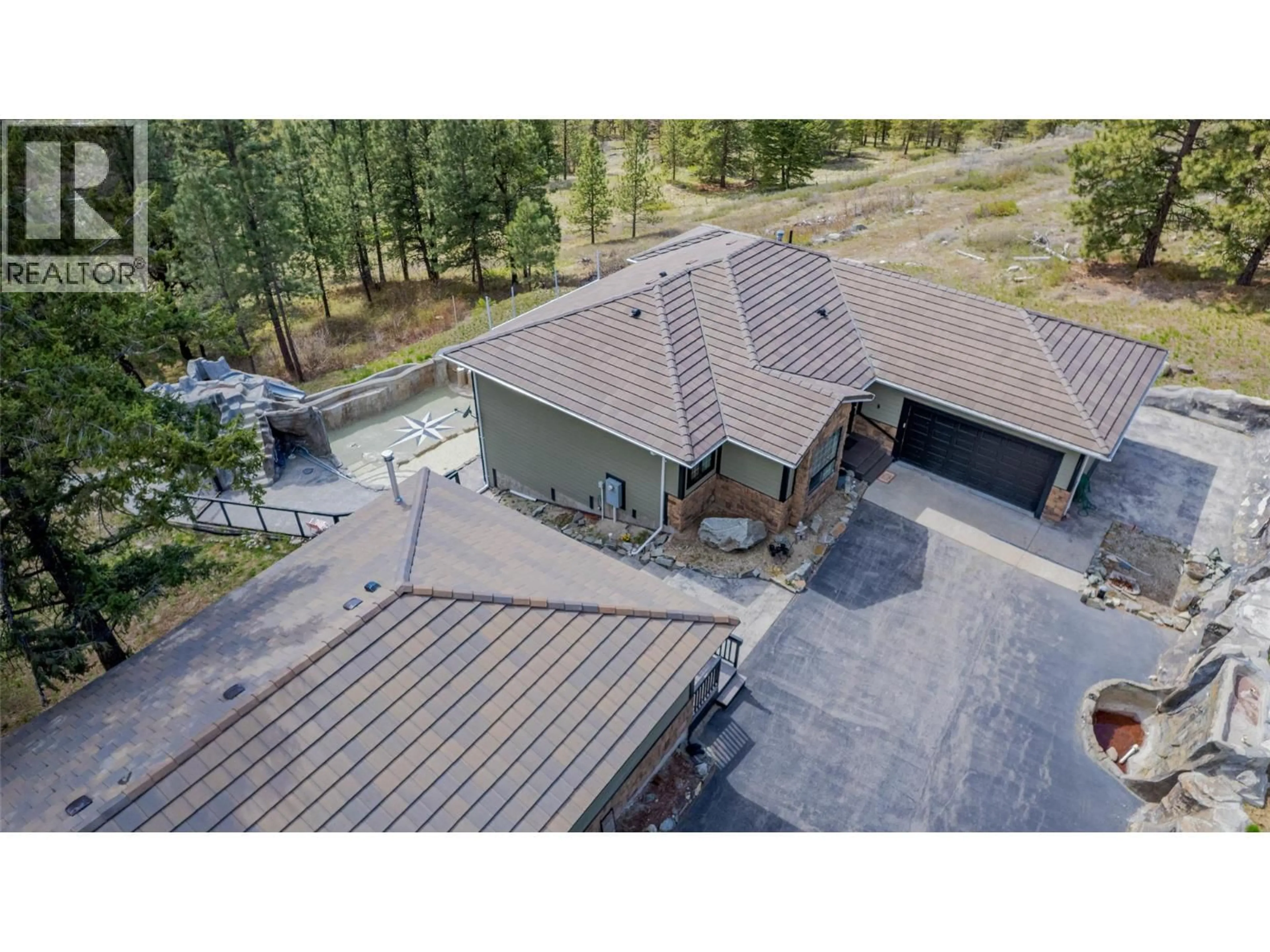 A pic from outside/outdoor area/front of a property/back of a property/a pic from drone, unknown for 1370 BULLMOOSE WAY, Osoyoos British Columbia V0H1V6