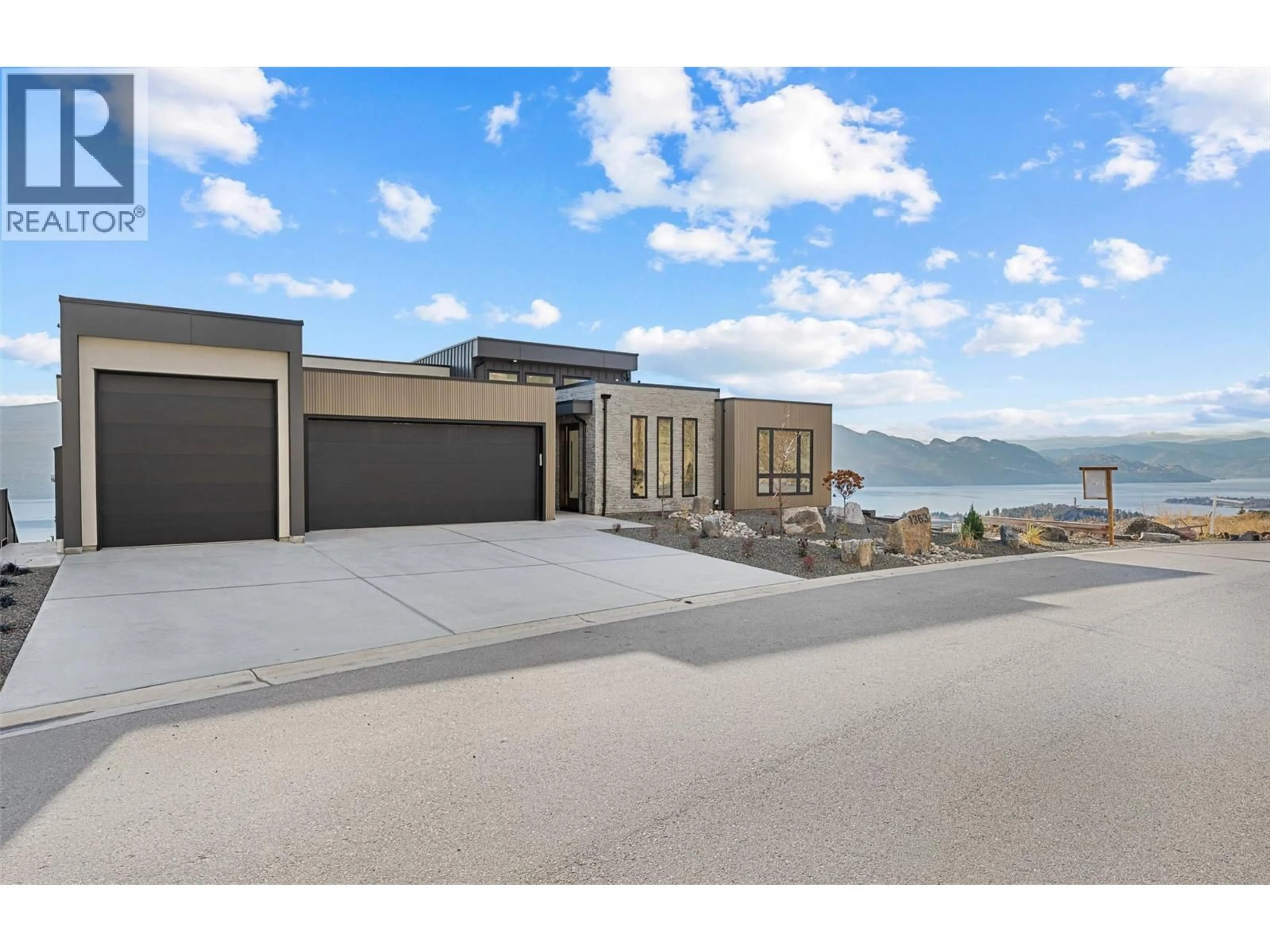 A pic from outside/outdoor area/front of a property/back of a property/a pic from drone, water/lake/river/ocean view for 1363 VINEYARD DRIVE, West Kelowna British Columbia V4T0E9