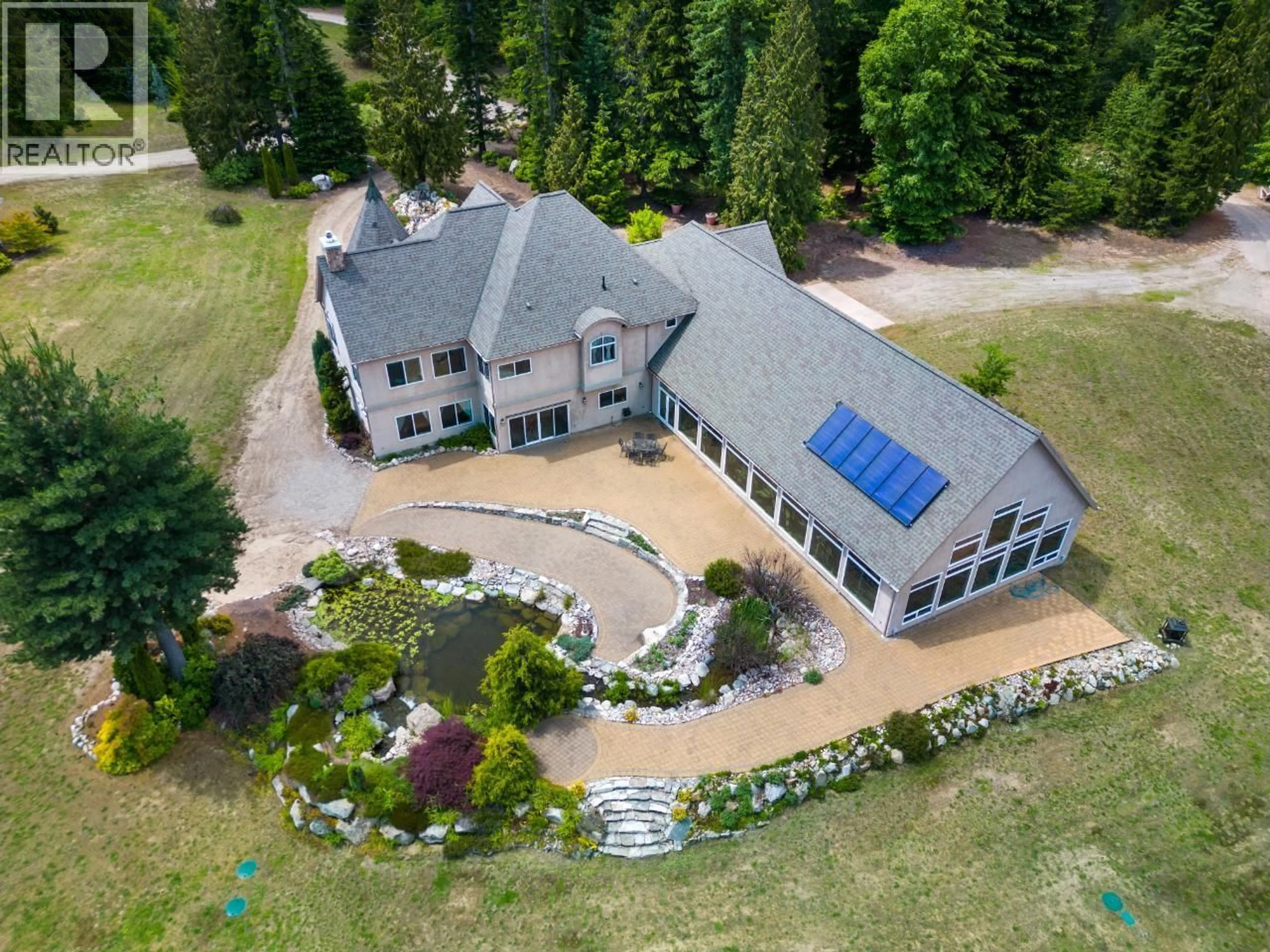 A pic from outside/outdoor area/front of a property/back of a property/a pic from drone, unknown for 1480 NIGHTHAWK DRIVE, Castlegar British Columbia V1N4S2