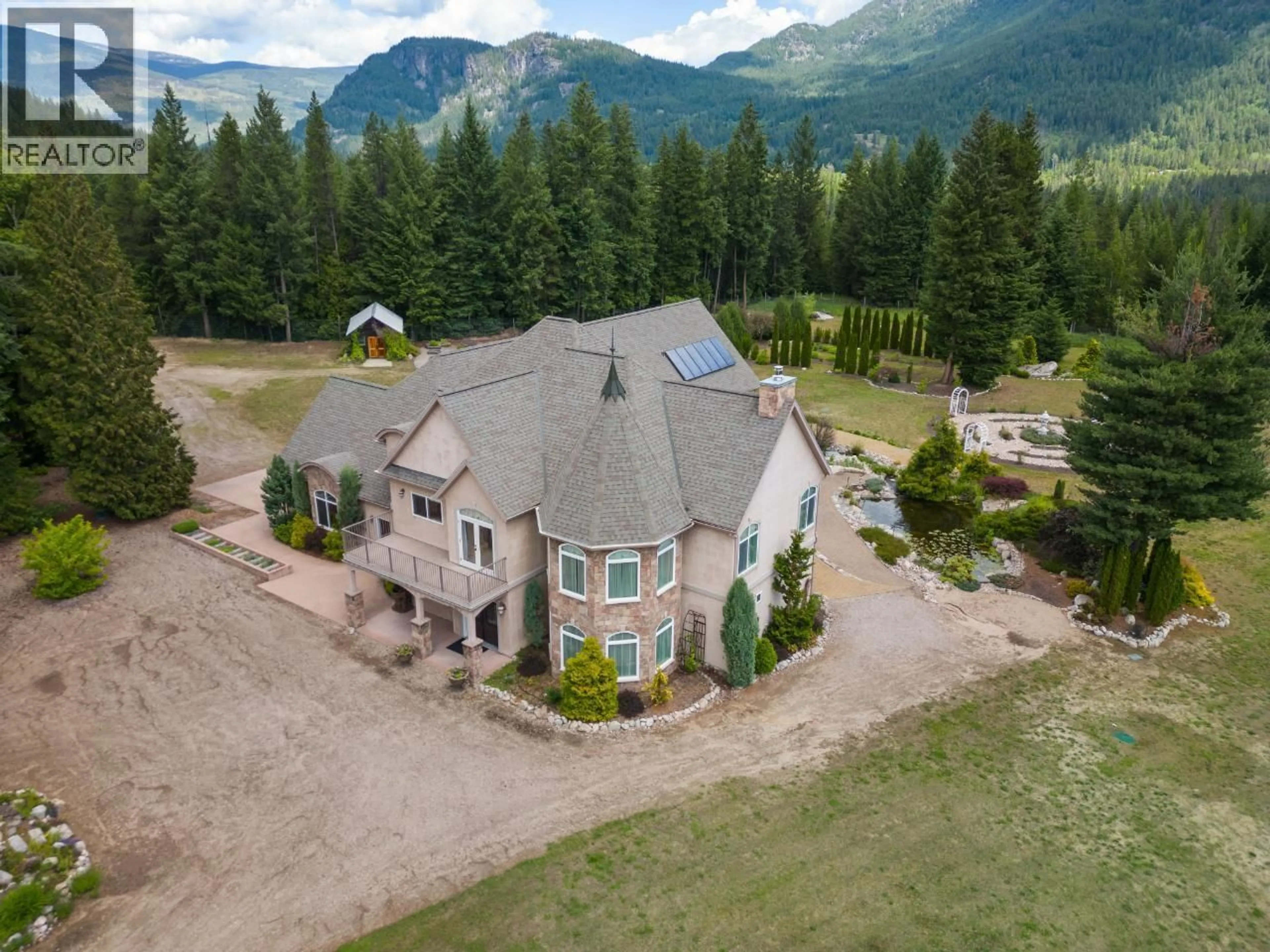A pic from outside/outdoor area/front of a property/back of a property/a pic from drone, mountain view for 1480 NIGHTHAWK DRIVE, Castlegar British Columbia V1N4S2