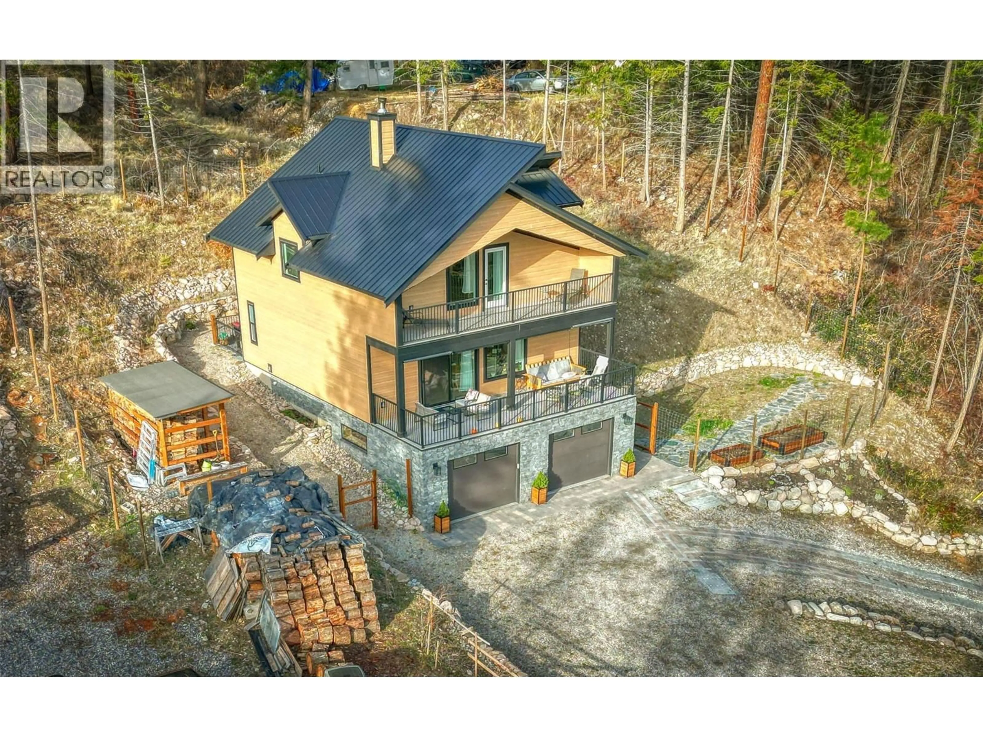 A pic from outside/outdoor area/front of a property/back of a property/a pic from drone, unknown for 634 UDELL ROAD, Vernon British Columbia V1H2G3