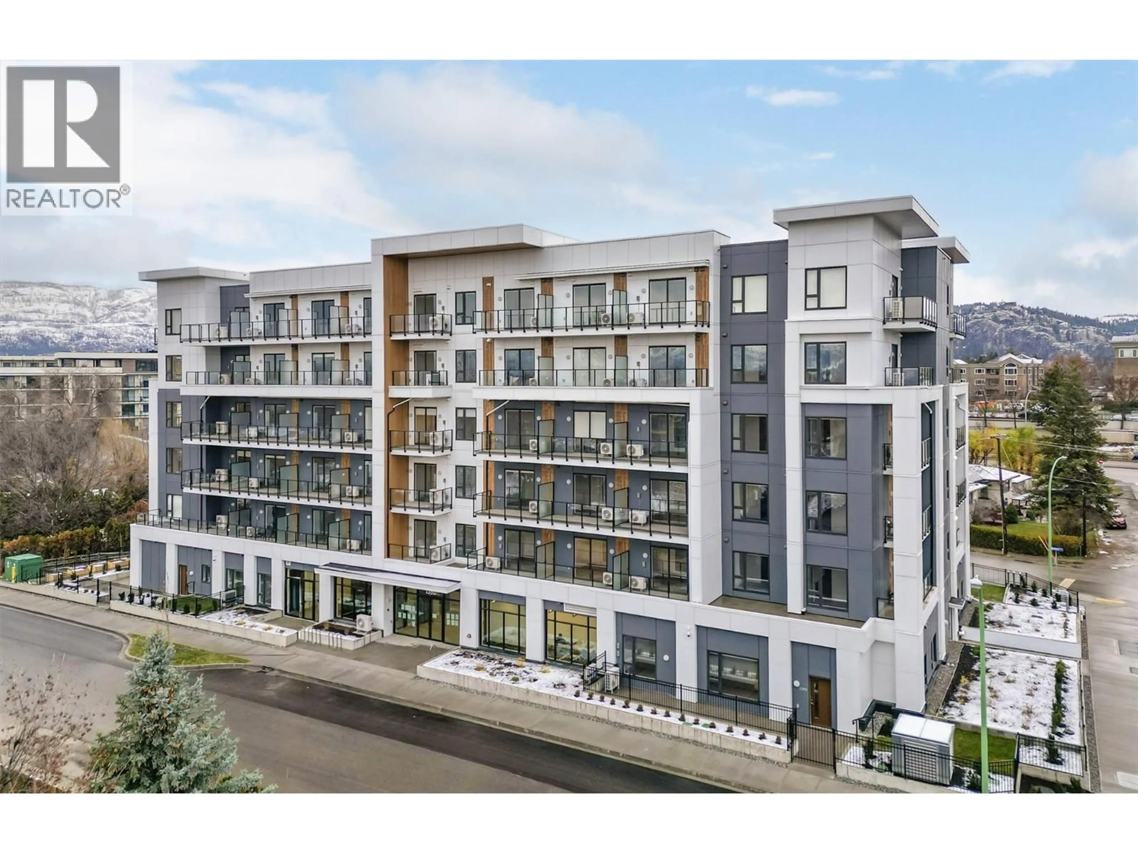 A pic from outside/outdoor area/front of a property/back of a property/a pic from drone, unknown for 203 - 1380 PRIDHAM AVENUE, Kelowna British Columbia V1Y0P7