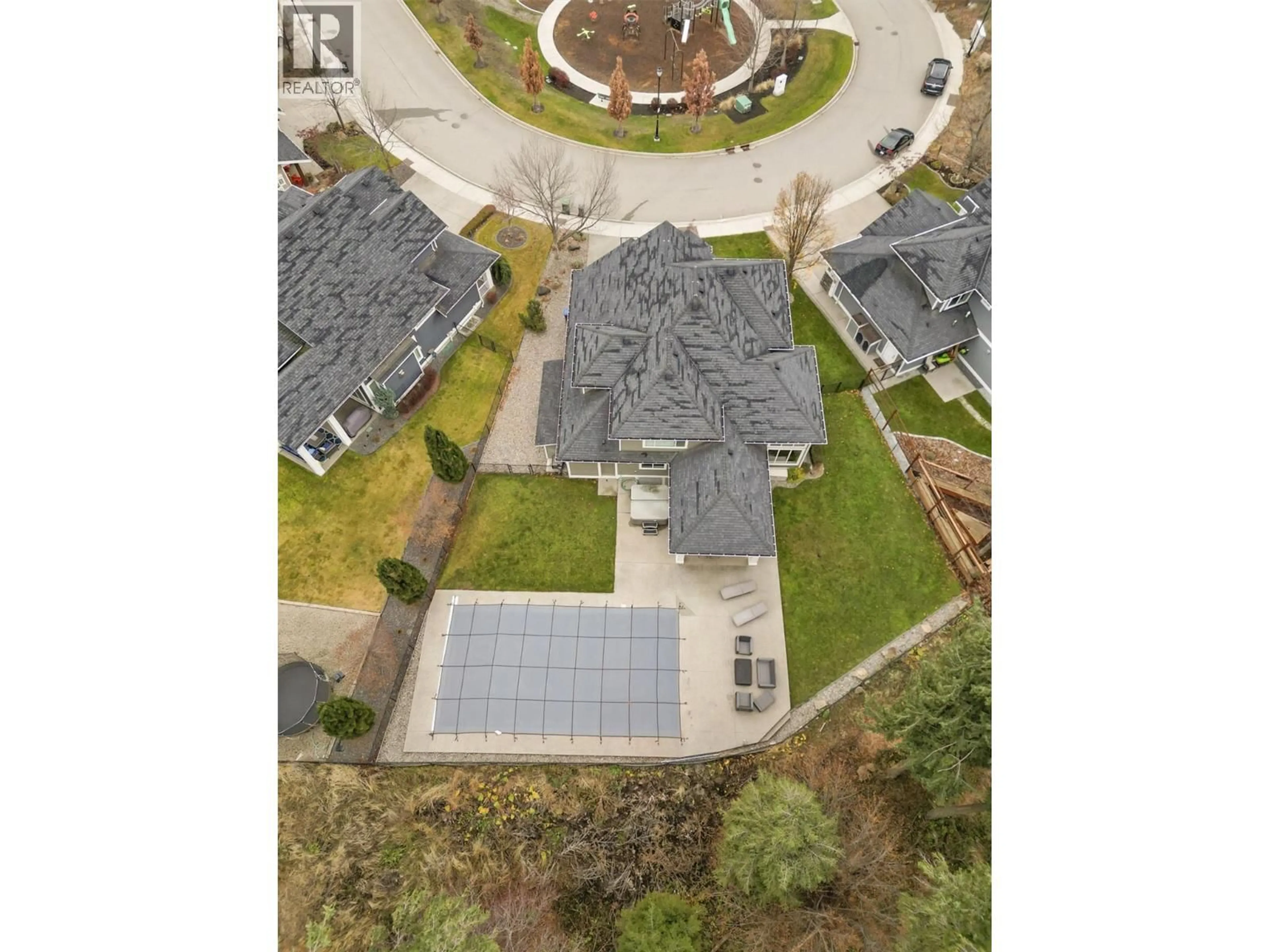 A pic from outside/outdoor area/front of a property/back of a property/a pic from drone, street for 152 LOST CREEK COURT, Kelowna British Columbia V1V3B7