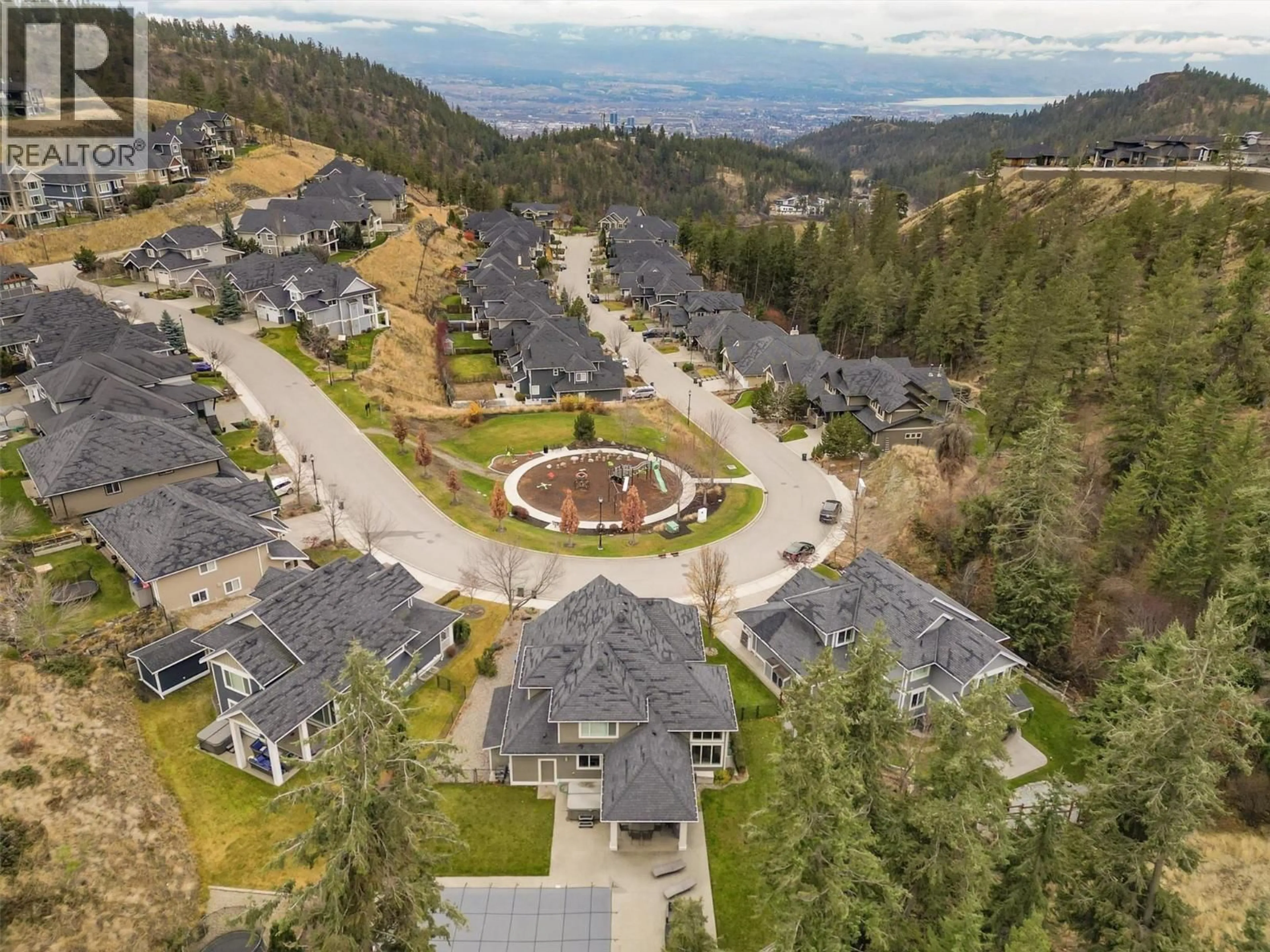 A pic from outside/outdoor area/front of a property/back of a property/a pic from drone, mountain view for 152 LOST CREEK COURT, Kelowna British Columbia V1V3B7