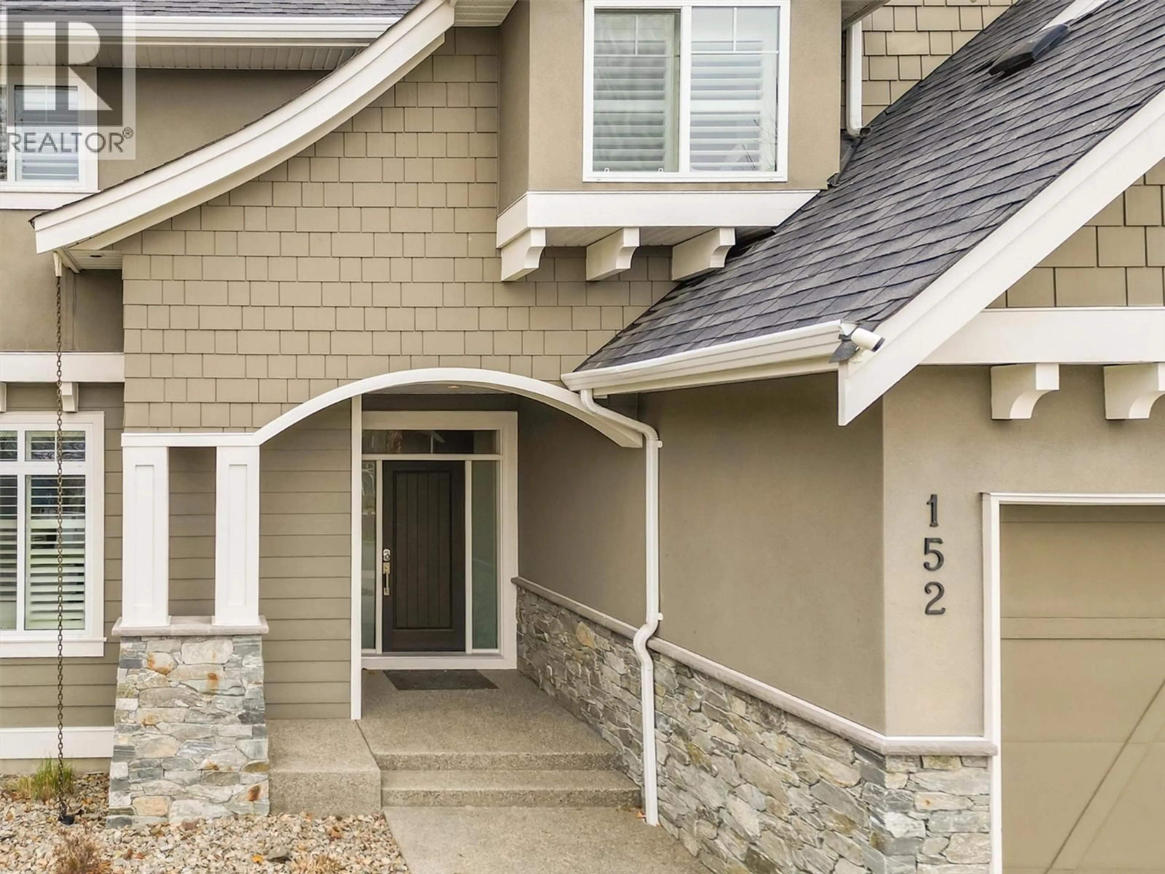 Home with vinyl exterior material, street for 152 LOST CREEK COURT, Kelowna British Columbia V1V3B7