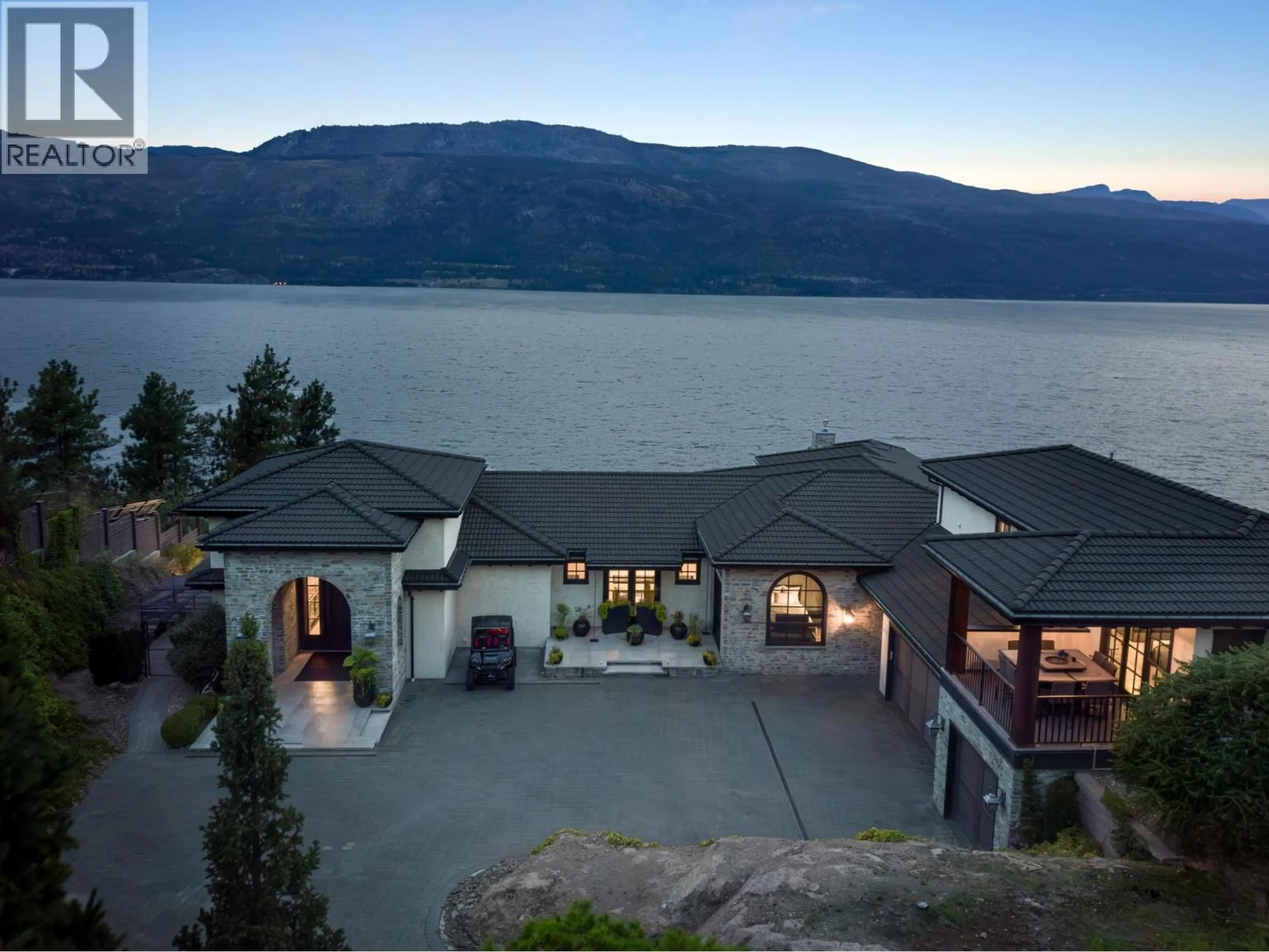 A pic from outside/outdoor area/front of a property/back of a property/a pic from drone, water/lake/river/ocean view for 13210 MCCREIGHT ROAD, Lake Country British Columbia V4V1C7