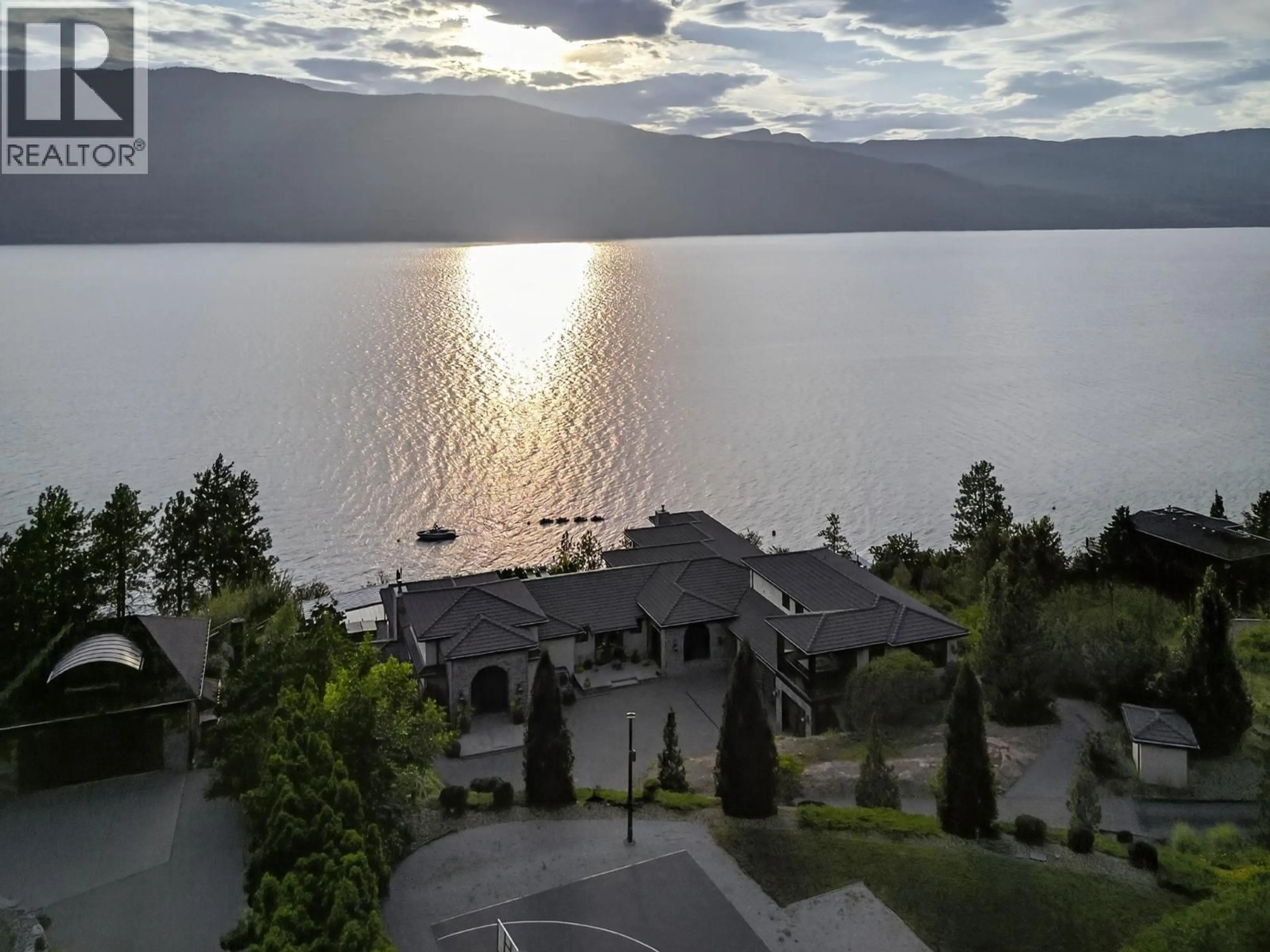 A pic from outside/outdoor area/front of a property/back of a property/a pic from drone, water/lake/river/ocean view for 13210 MCCREIGHT ROAD, Lake Country British Columbia V4V1C7