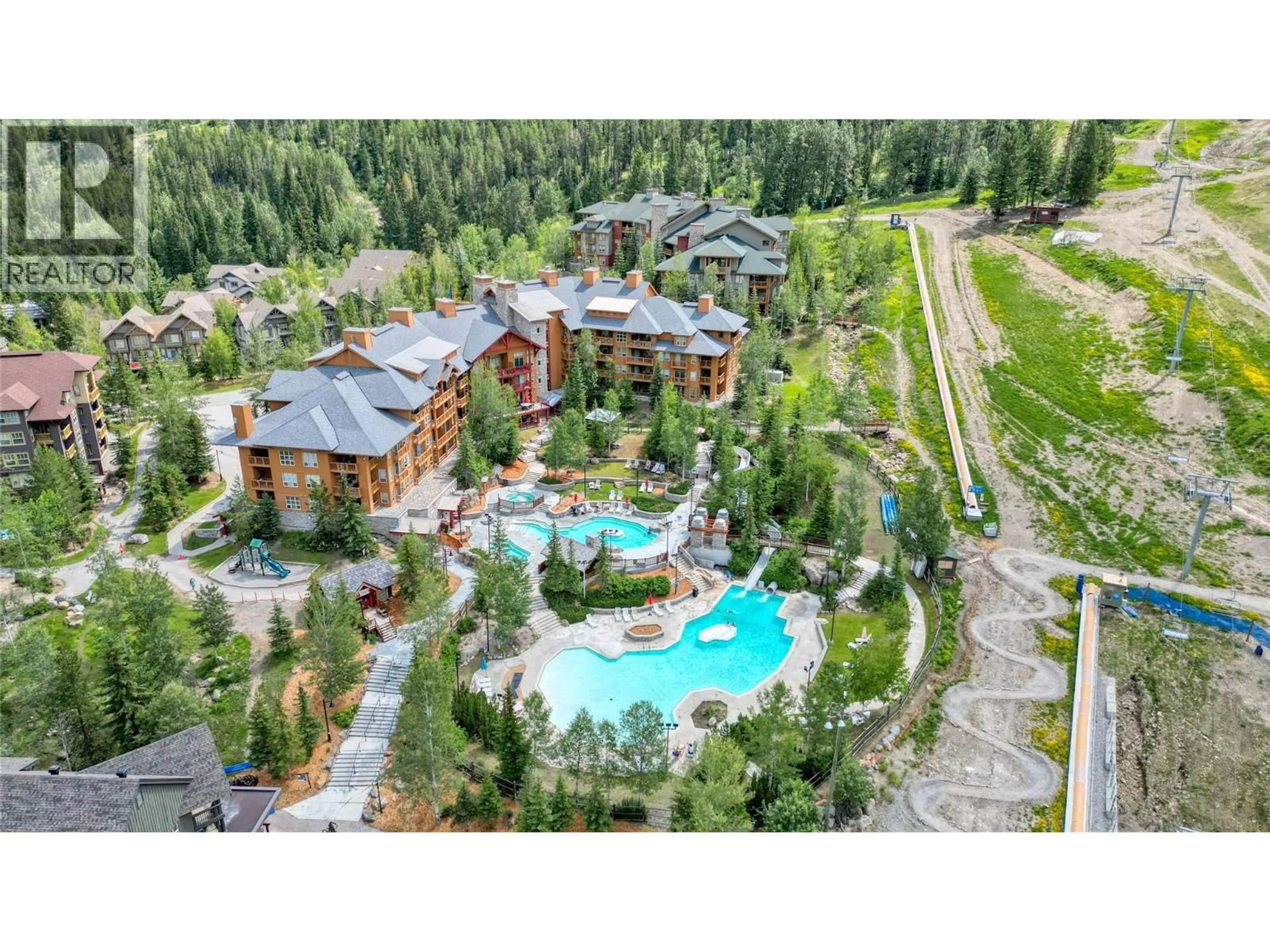 A pic from outside/outdoor area/front of a property/back of a property/a pic from drone, mountain view for 415 - 2090 SUMMIT DRIVE, Panorama British Columbia V0A1T0