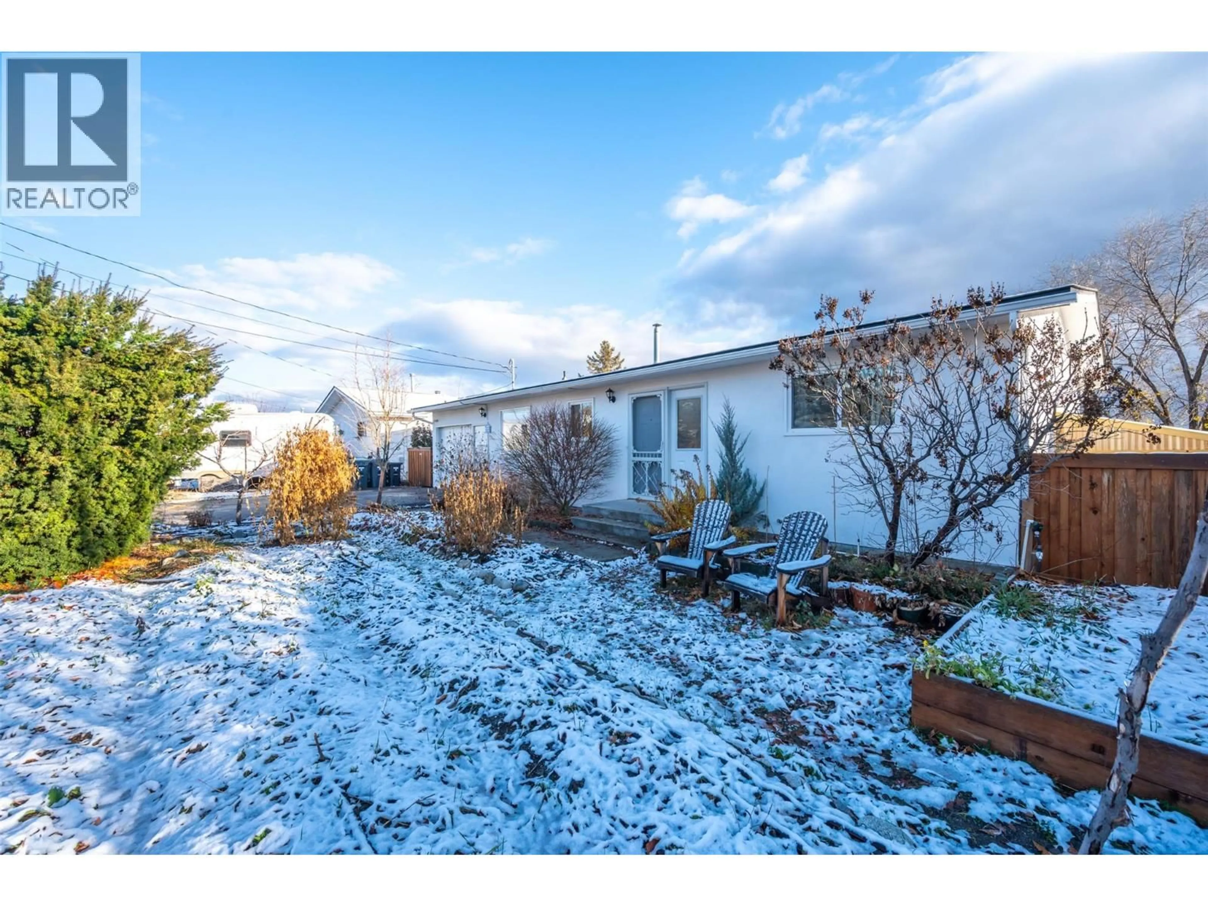 A pic from outside/outdoor area/front of a property/back of a property/a pic from drone, street for 13031 STEVEN AVENUE, Summerland British Columbia V0H1Z0