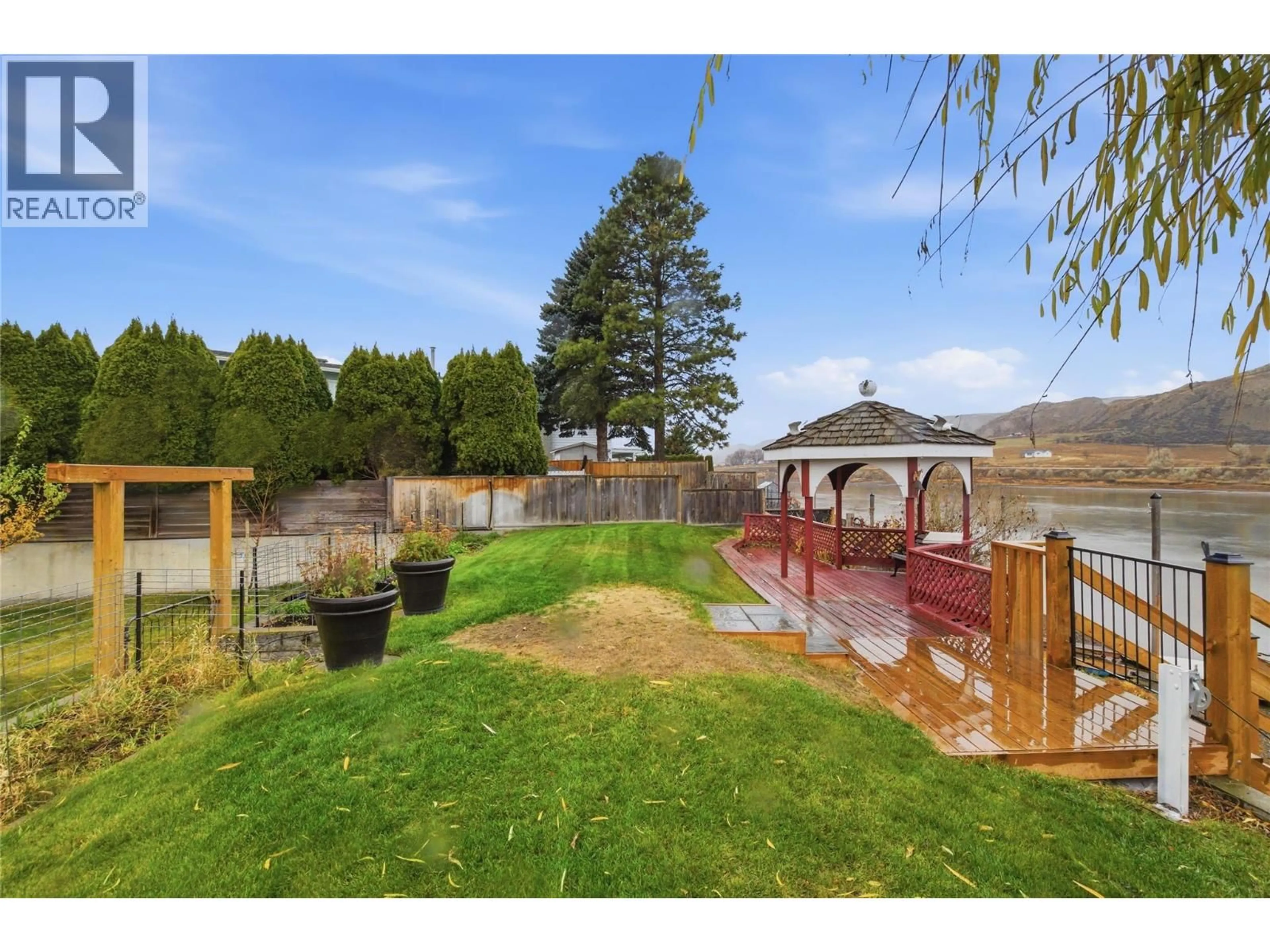 A pic from outside/outdoor area/front of a property/back of a property/a pic from drone, water/lake/river/ocean view for 2578 THOMPSON DRIVE, Kamloops British Columbia V2C4L4