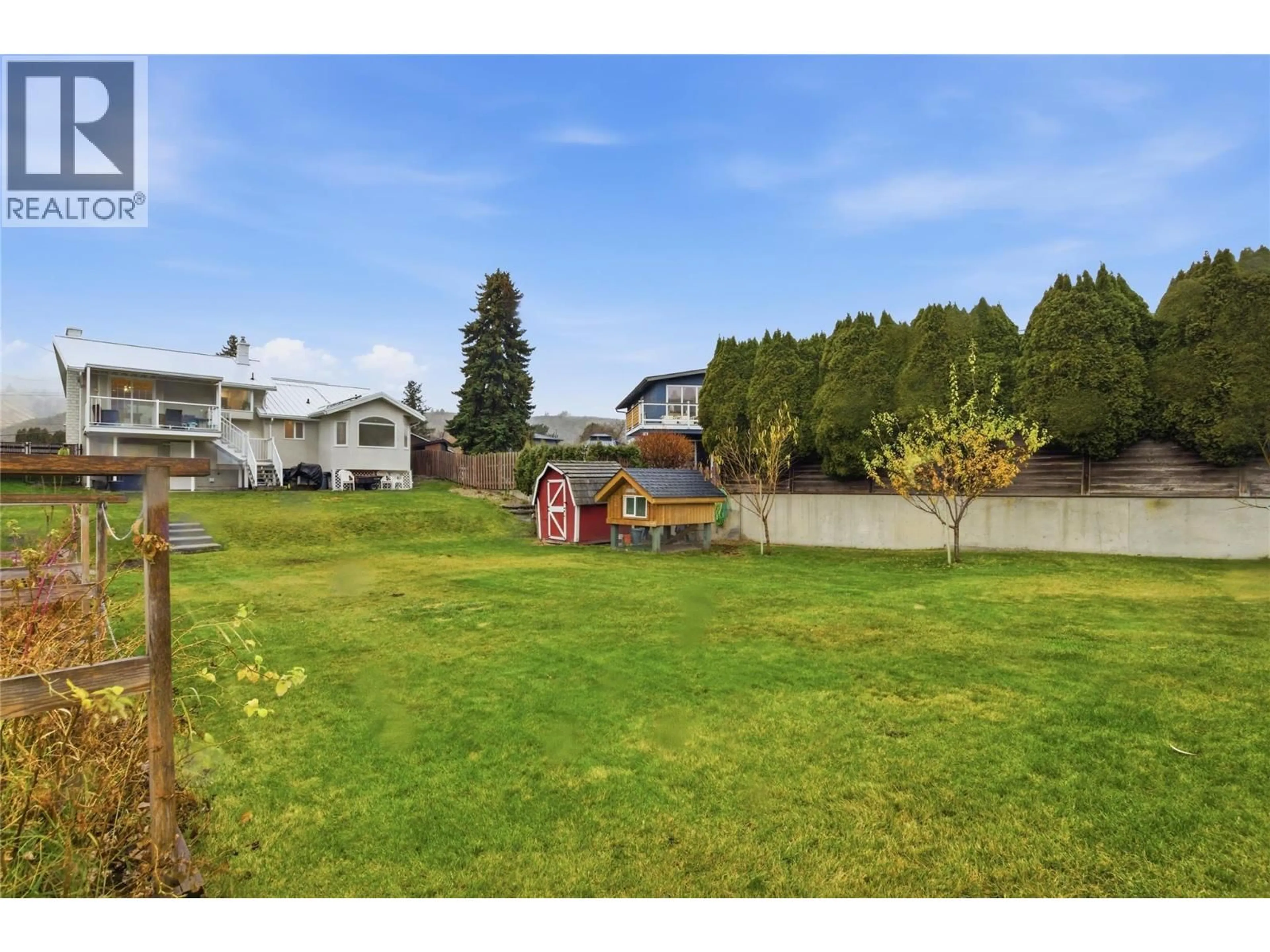 A pic from outside/outdoor area/front of a property/back of a property/a pic from drone, water/lake/river/ocean view for 2578 THOMPSON DRIVE, Kamloops British Columbia V2C4L4