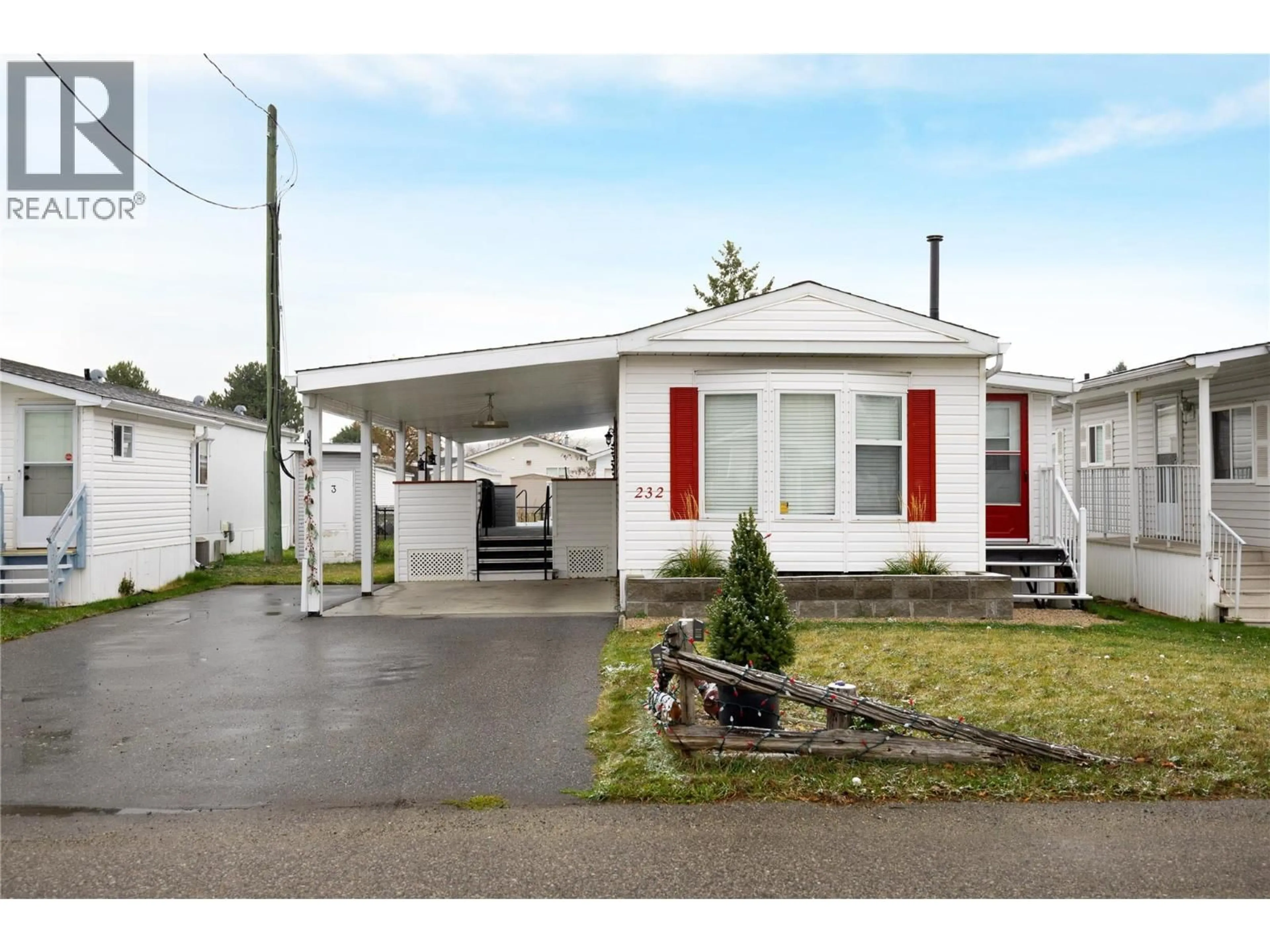 Home with vinyl exterior material, street for 232 - 6710 TRONSON ROAD, Vernon British Columbia V1H1X6