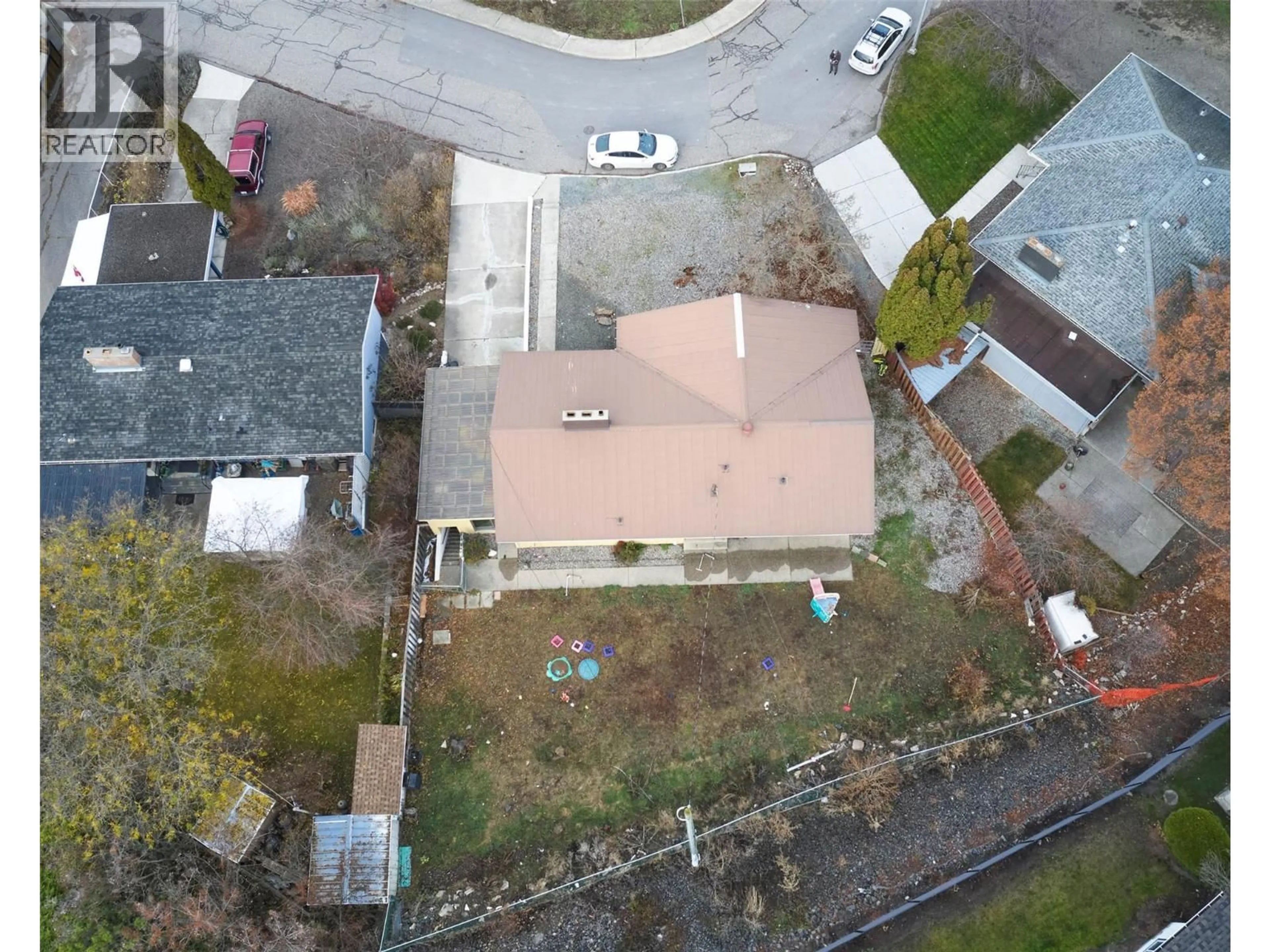 A pic from outside/outdoor area/front of a property/back of a property/a pic from drone, street for 3600 37 AVENUE, Vernon British Columbia V1T2Y6