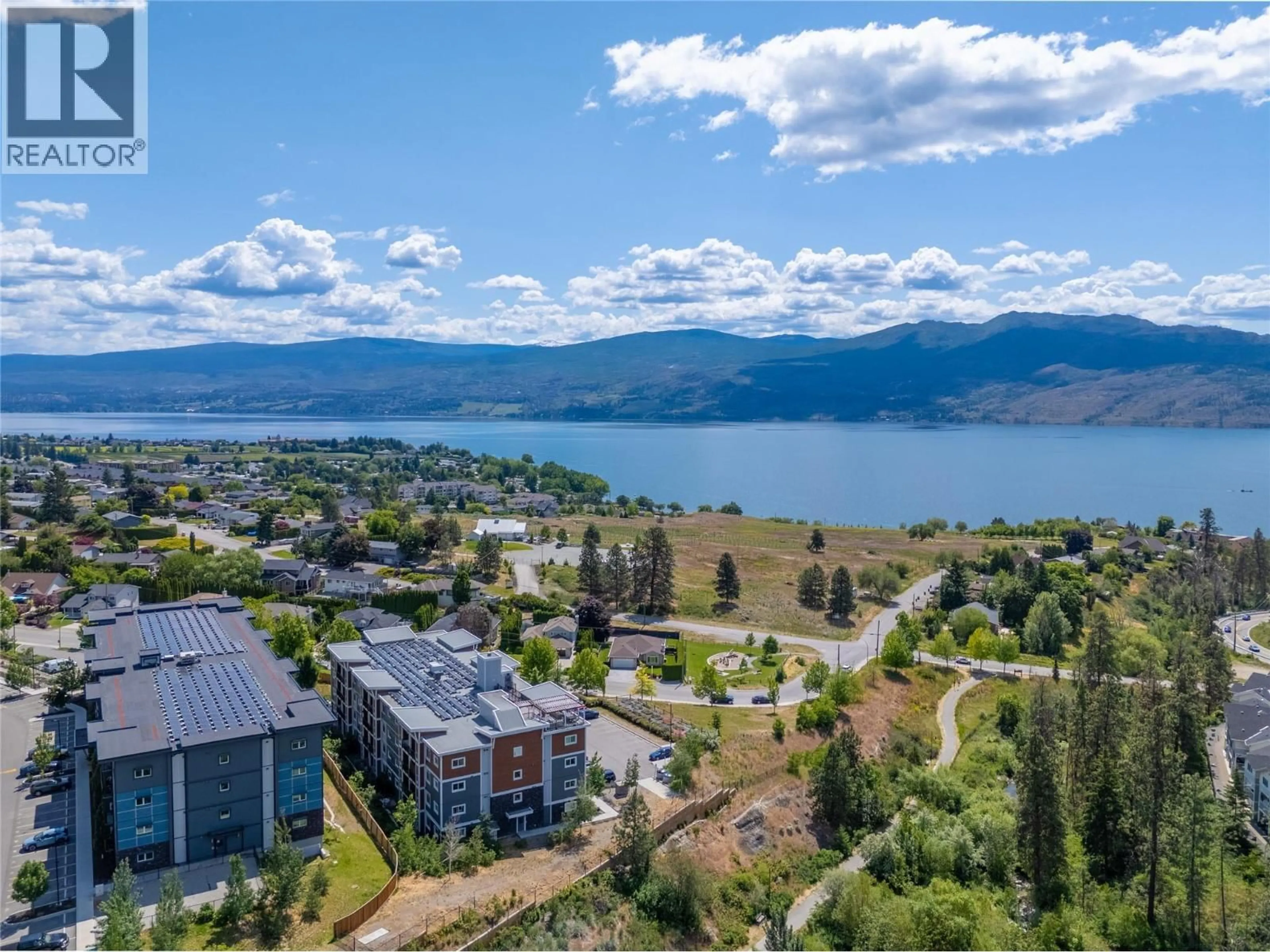 A pic from outside/outdoor area/front of a property/back of a property/a pic from drone, water/lake/river/ocean view for 303 - 2250 MAJOROS ROAD, West Kelowna British Columbia V4T0A6